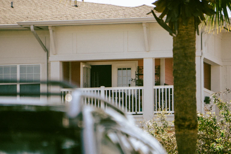 A house with a porch and palm tree — Queen Creek, AZ service area