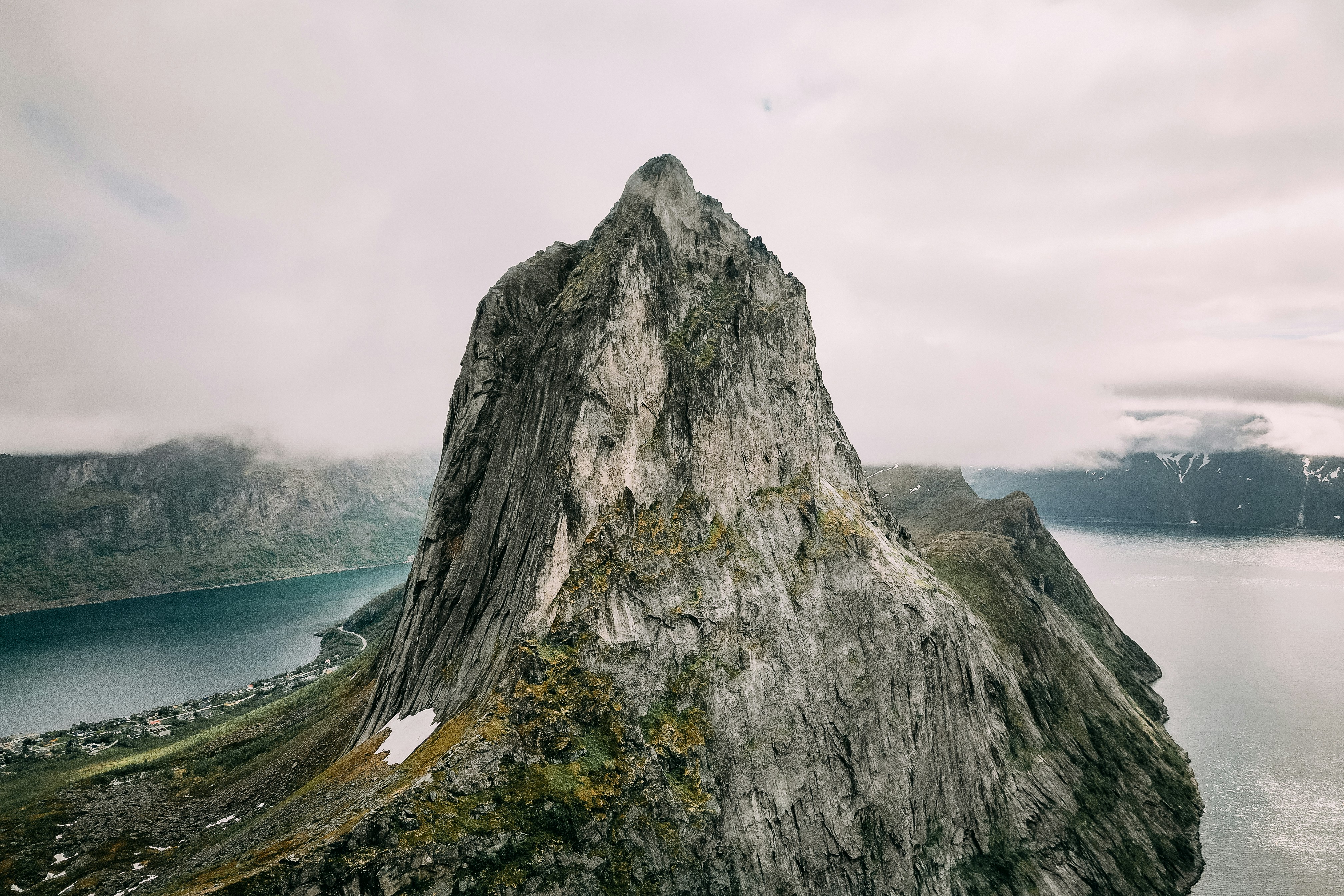 Jagged peaks rising from the Arctic coast of Senja