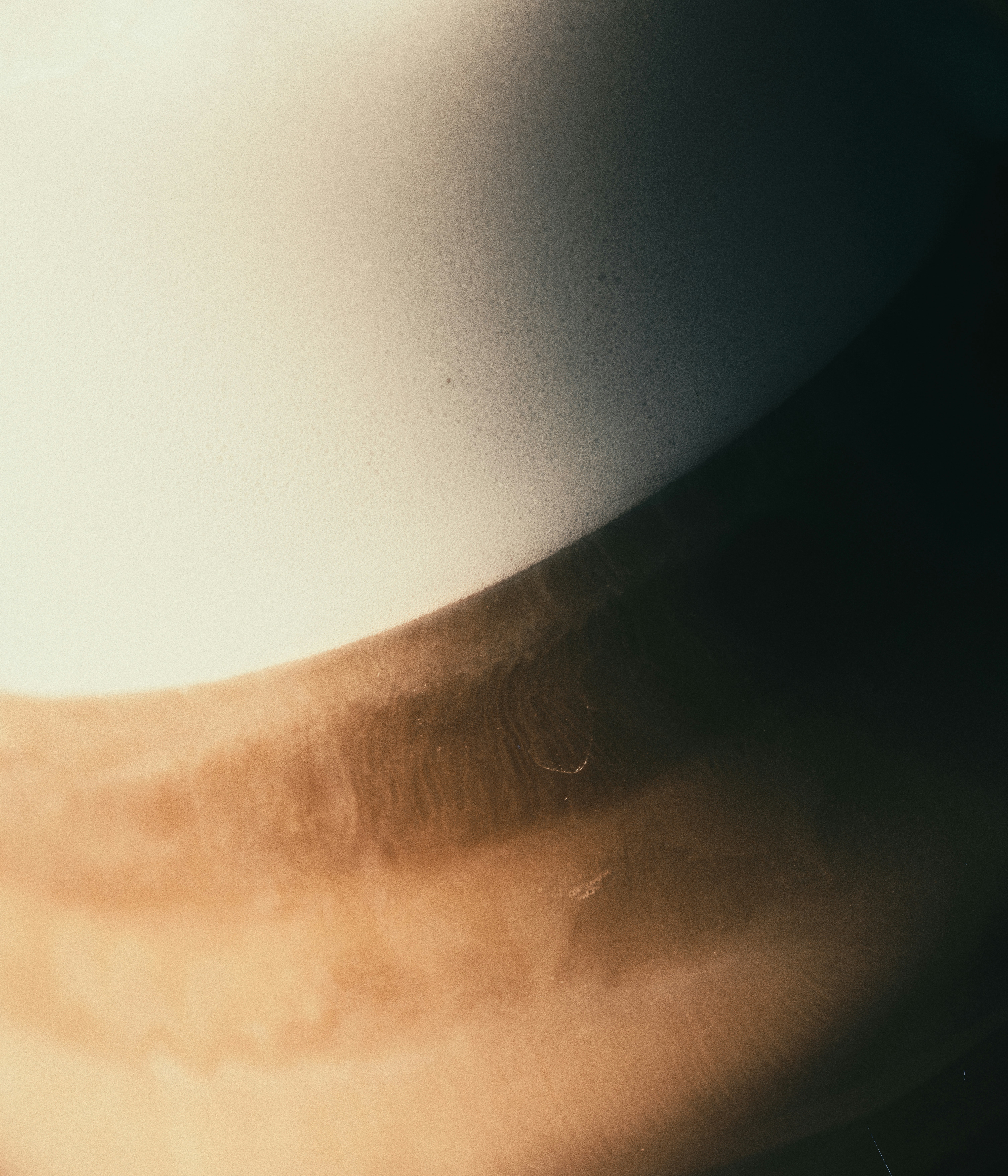 Close up of a light brown and white abstract texture