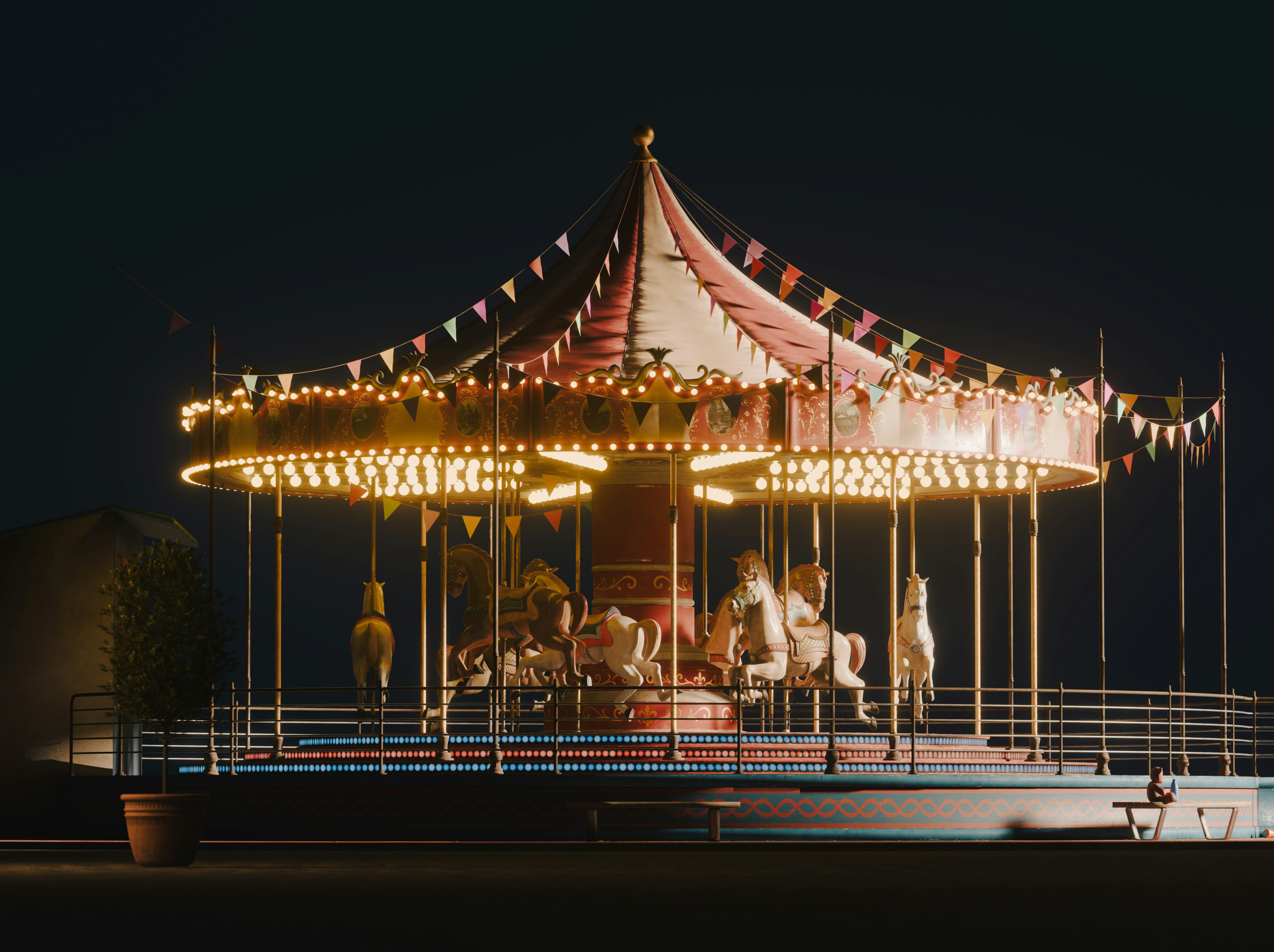 A brightly lit carousel at night with horses