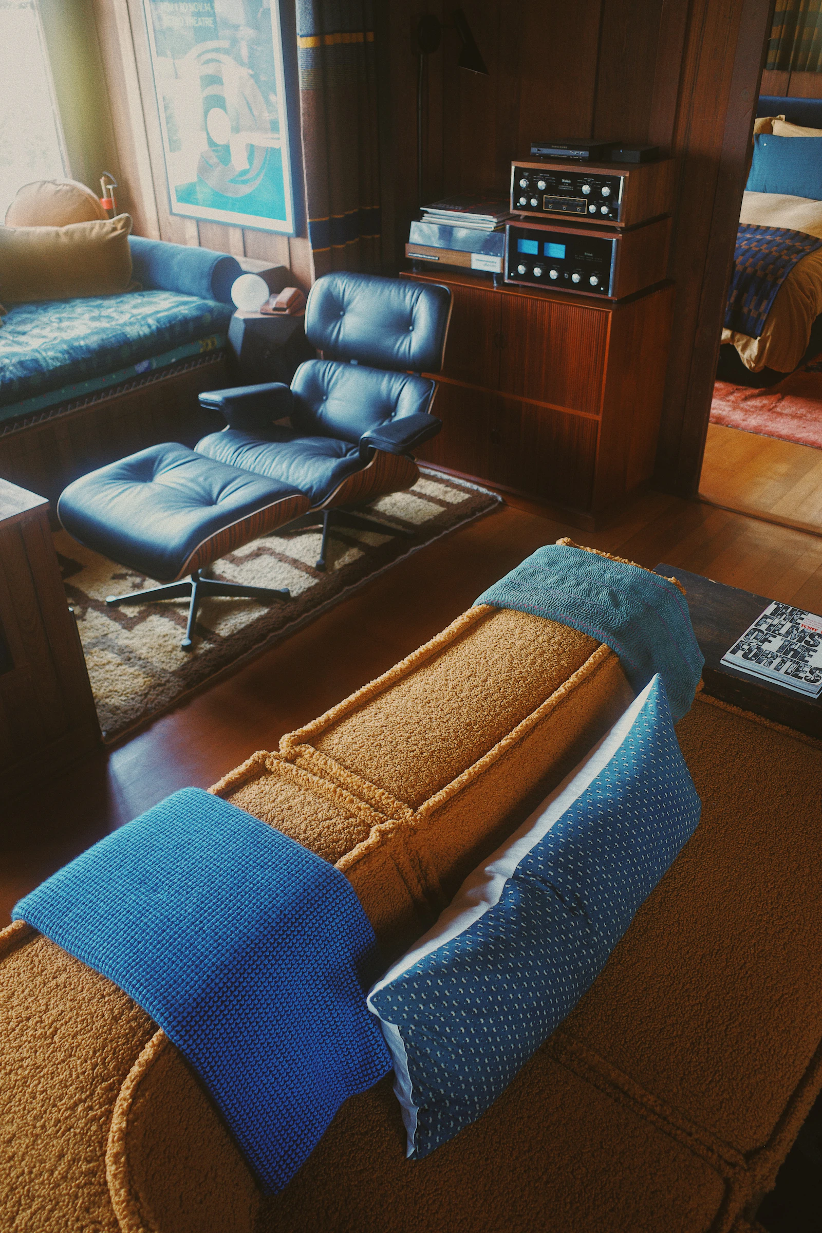 A mid-century modern room with an armchair, used for couples sessions