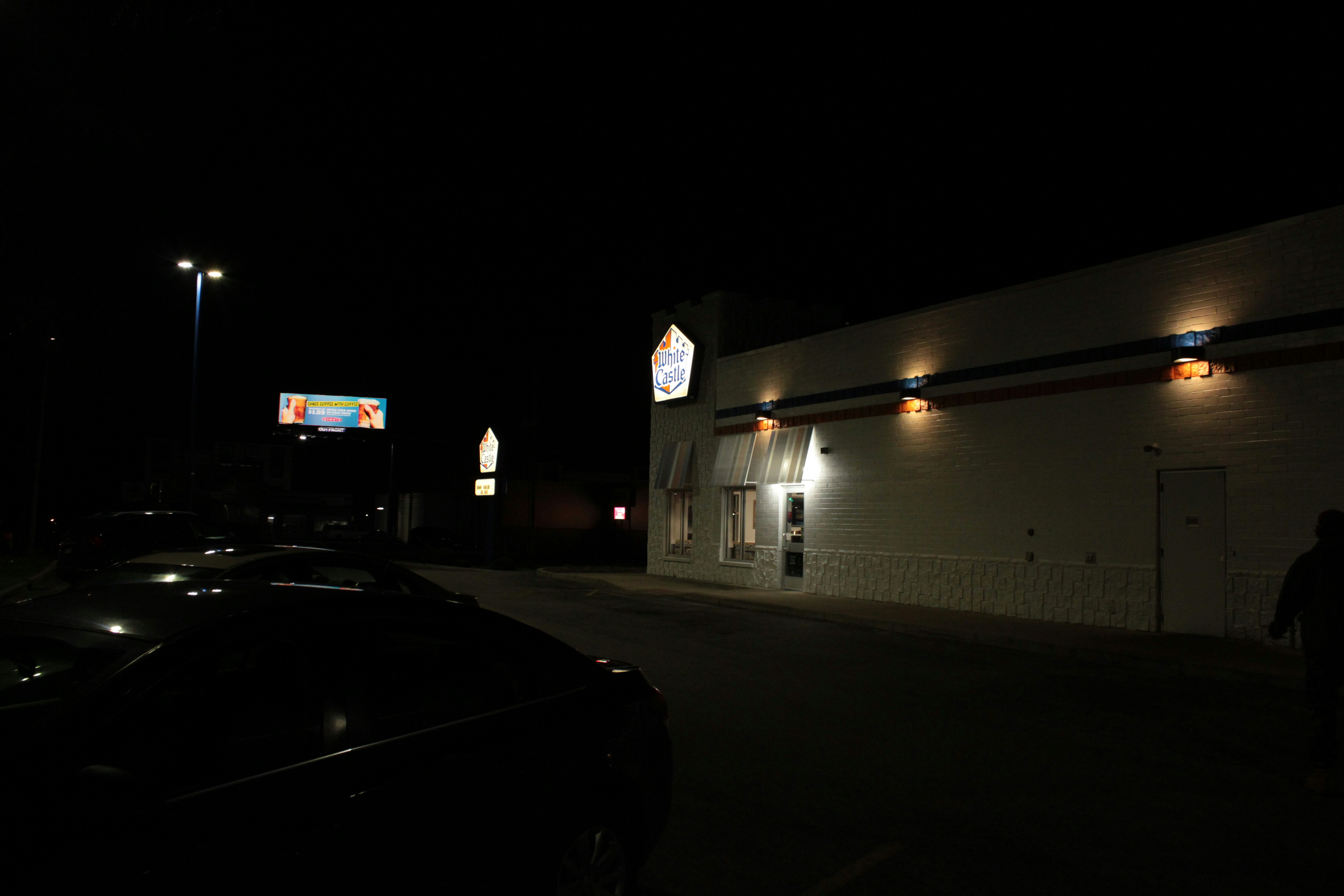 A building at night with lights on