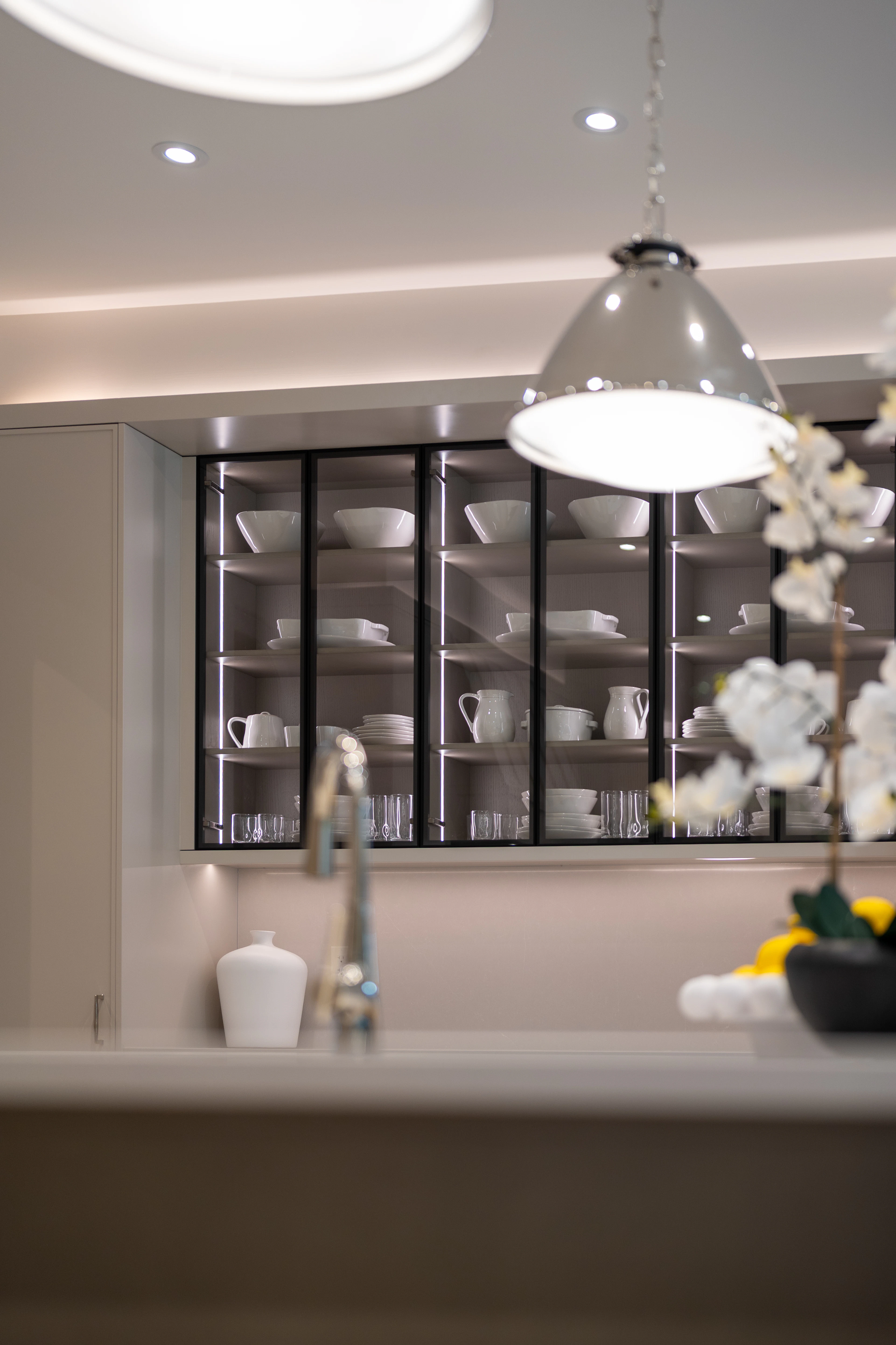 Illuminated glass-front cabinetry