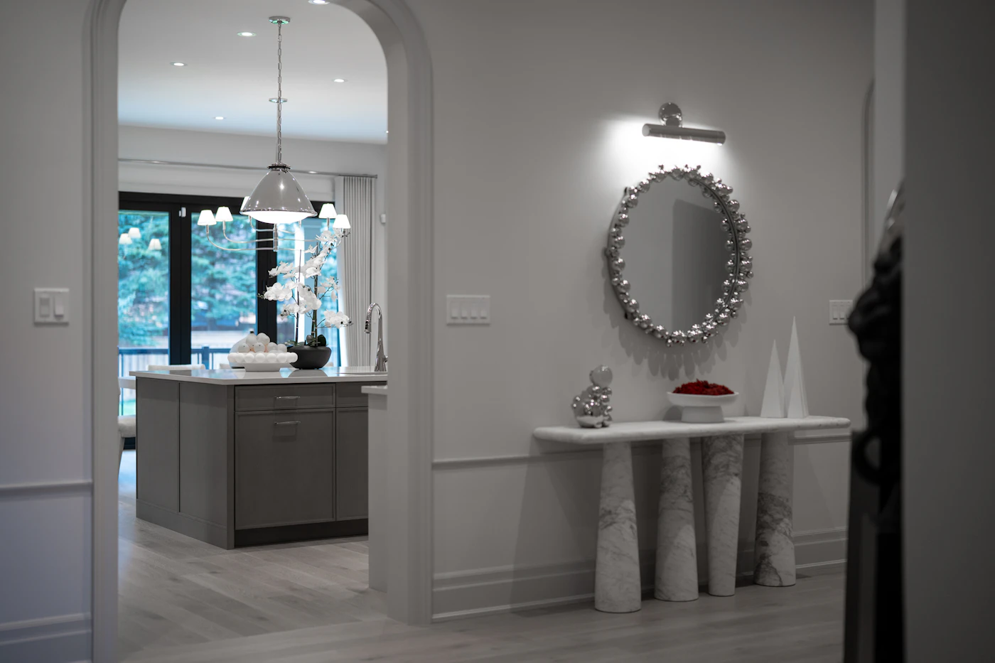 Luxury entryway with console table, mirror and marble surface for Roar Panther entryway console styling
