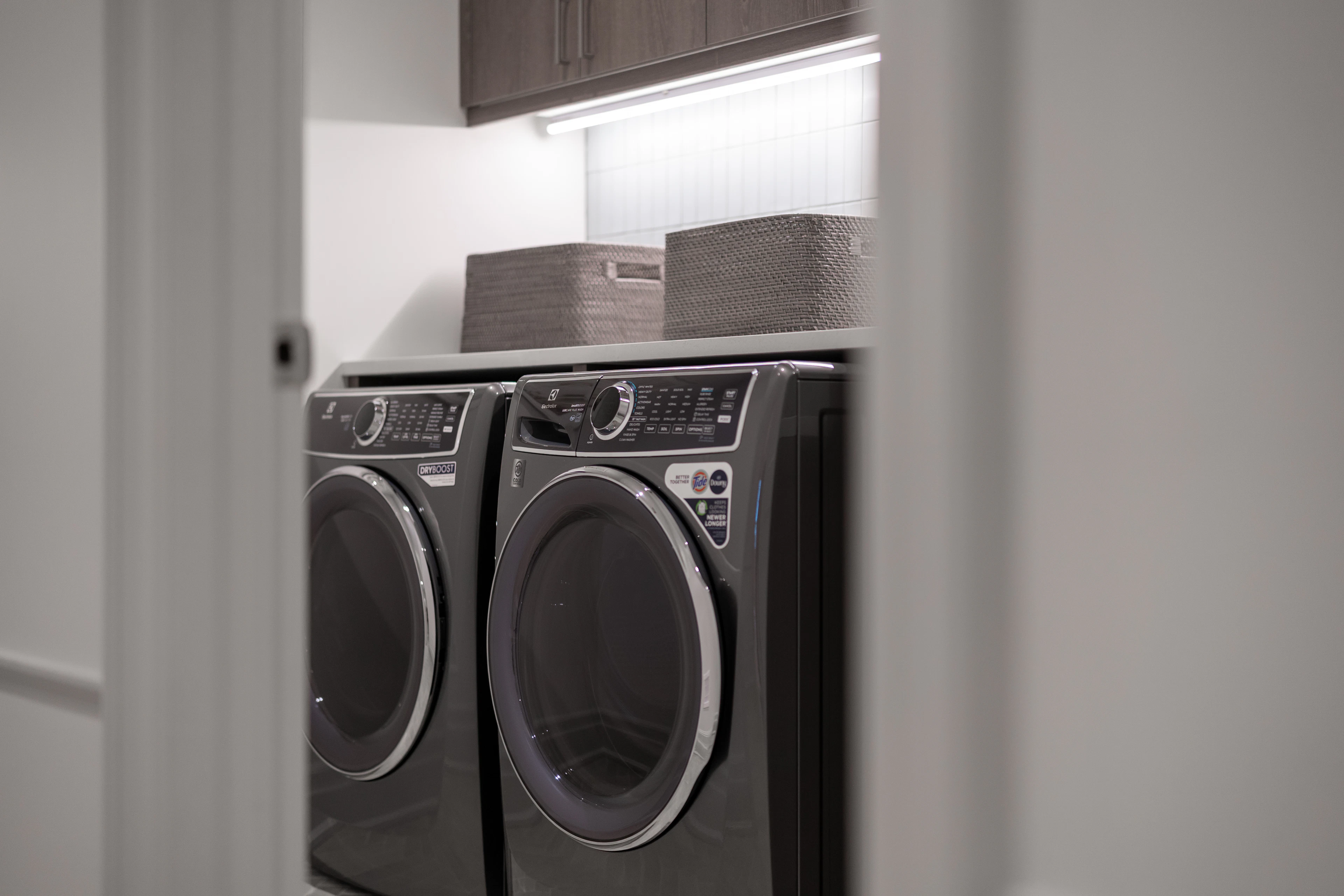Laundry room with a washing machine