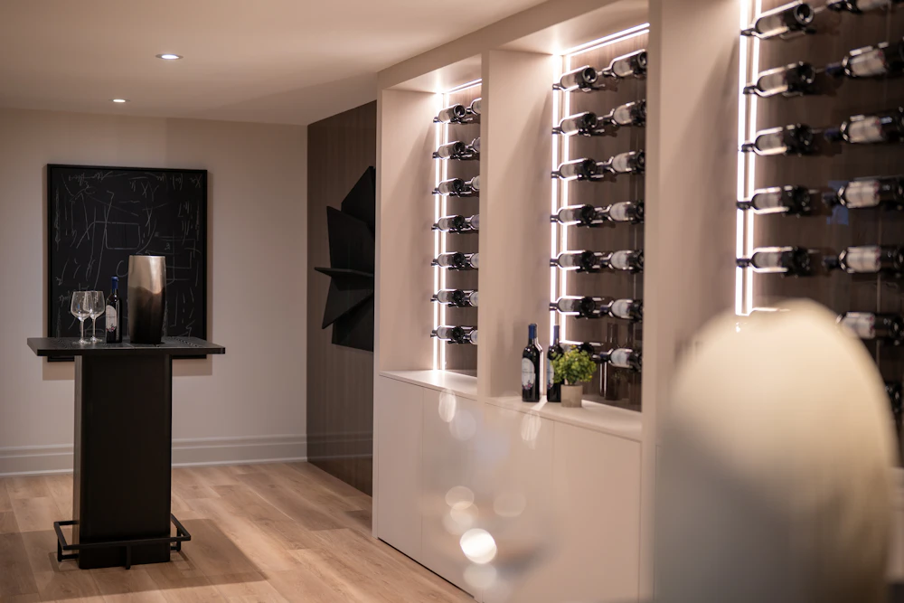 Wine cellar with illuminated racks of bottles