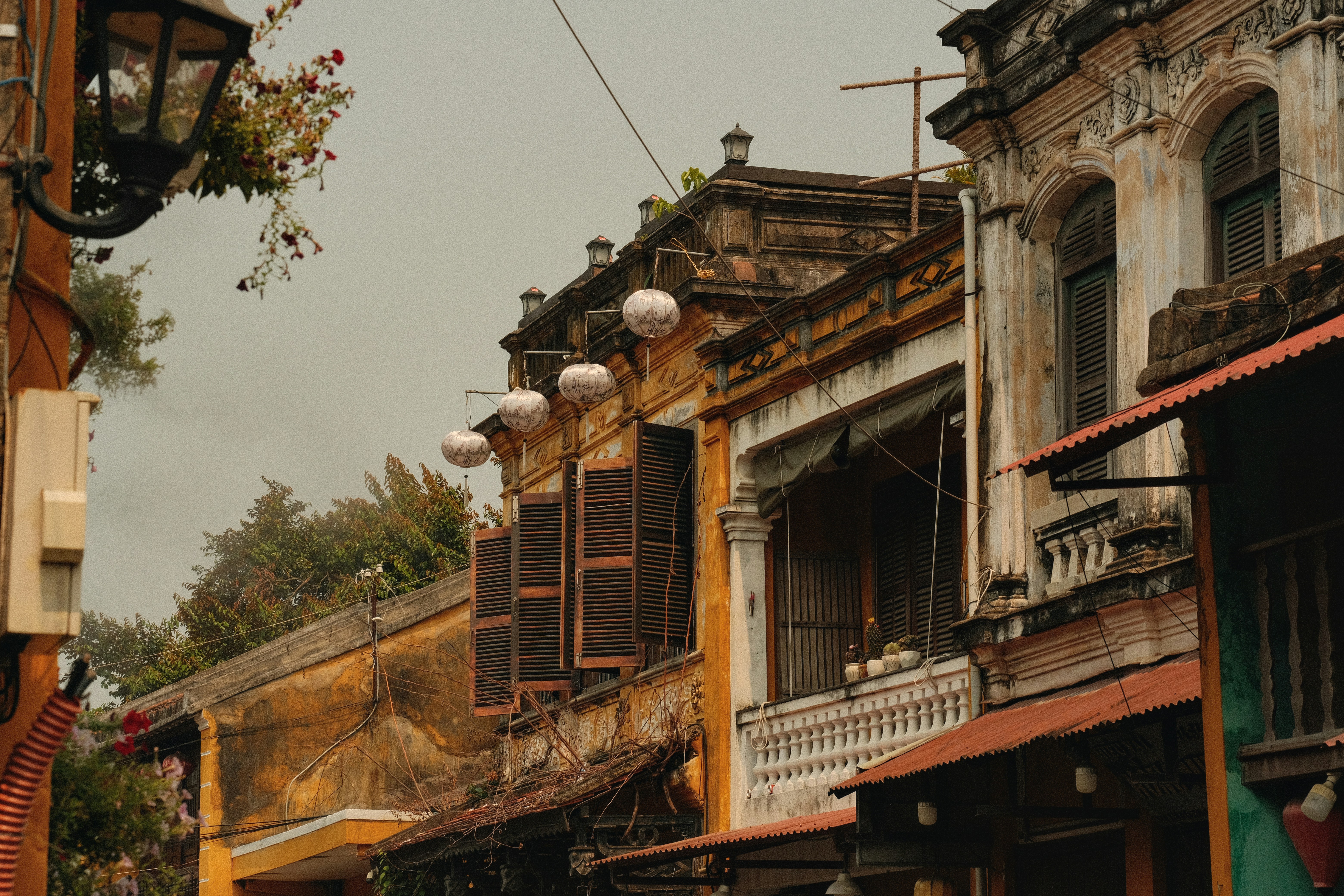Old buildings with weathered facades and shutters