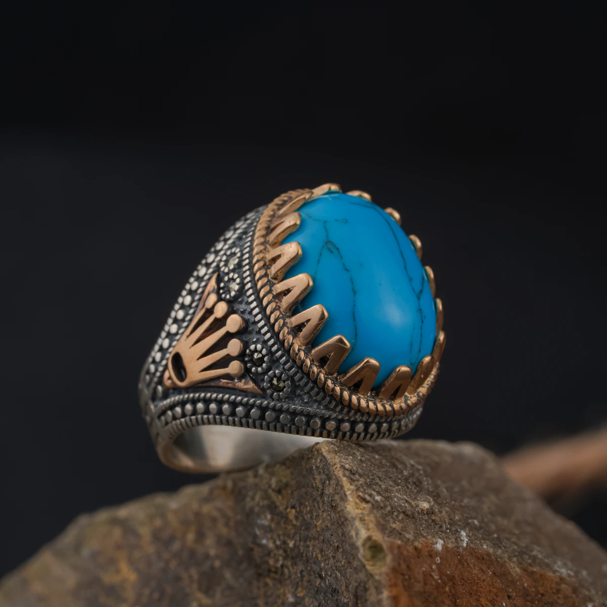An ornate silver ring close-up