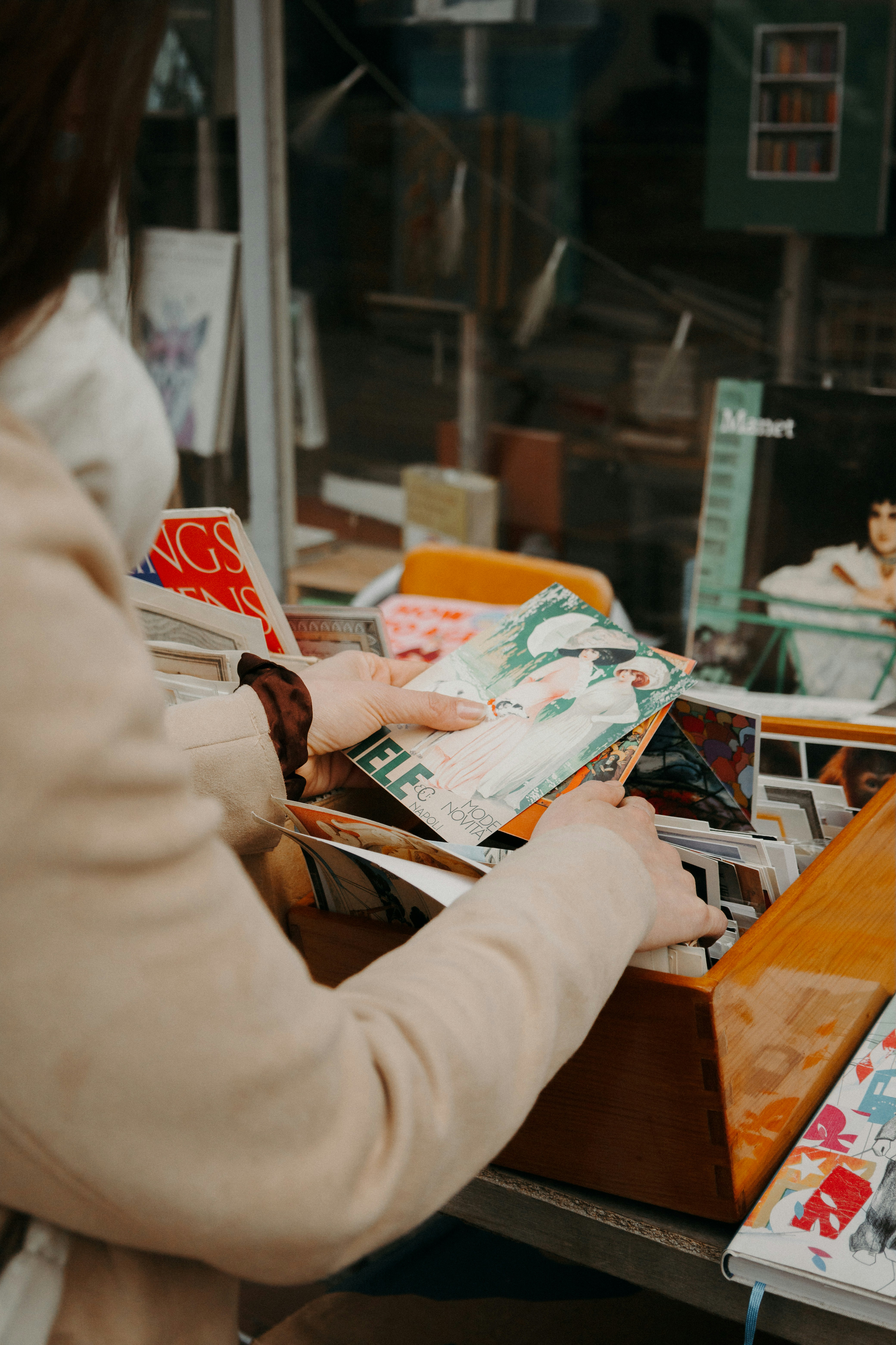 Woman browsing books in a store