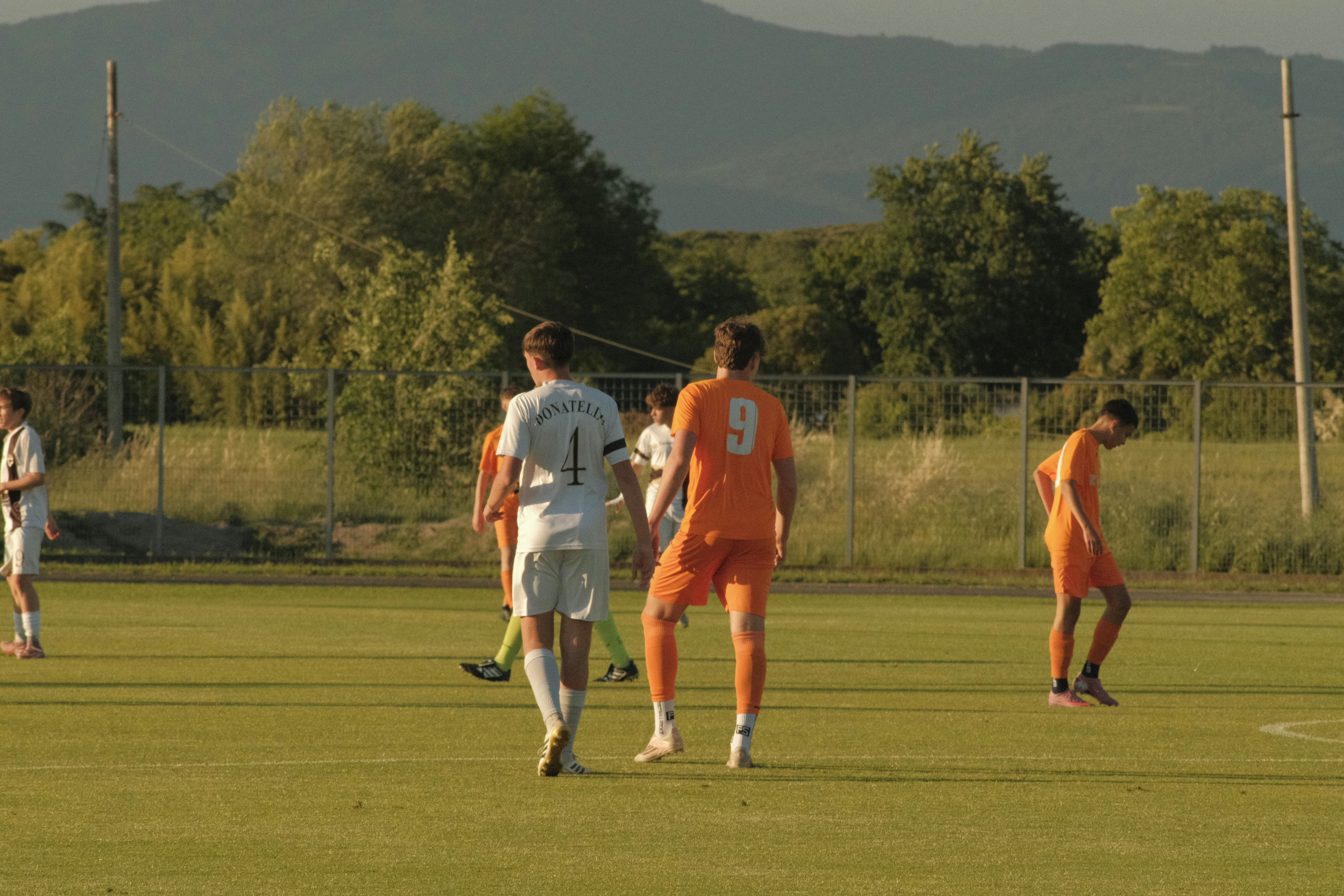 Soccer players on a field during a game
