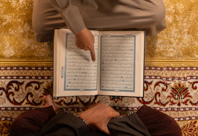 Two people reading the quran together