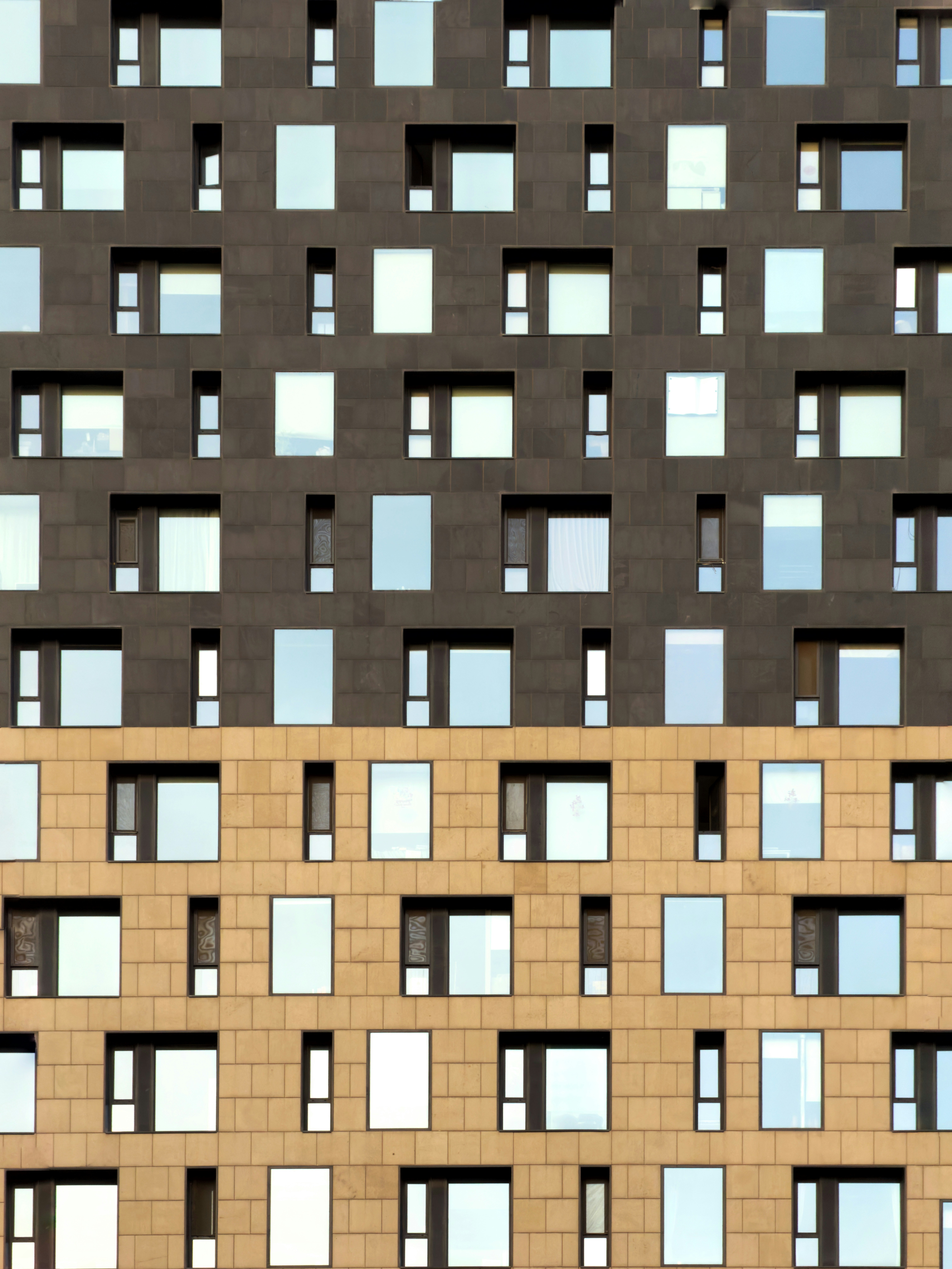 Modern building facade with repeating windows