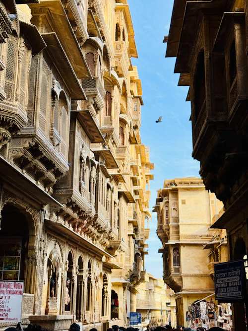 Narrow lane of carved sandstone houses