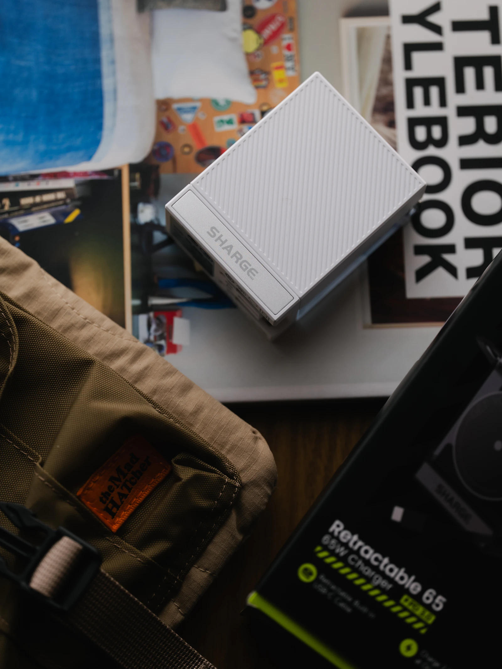 Portable charger and charging accessories arranged with magazines