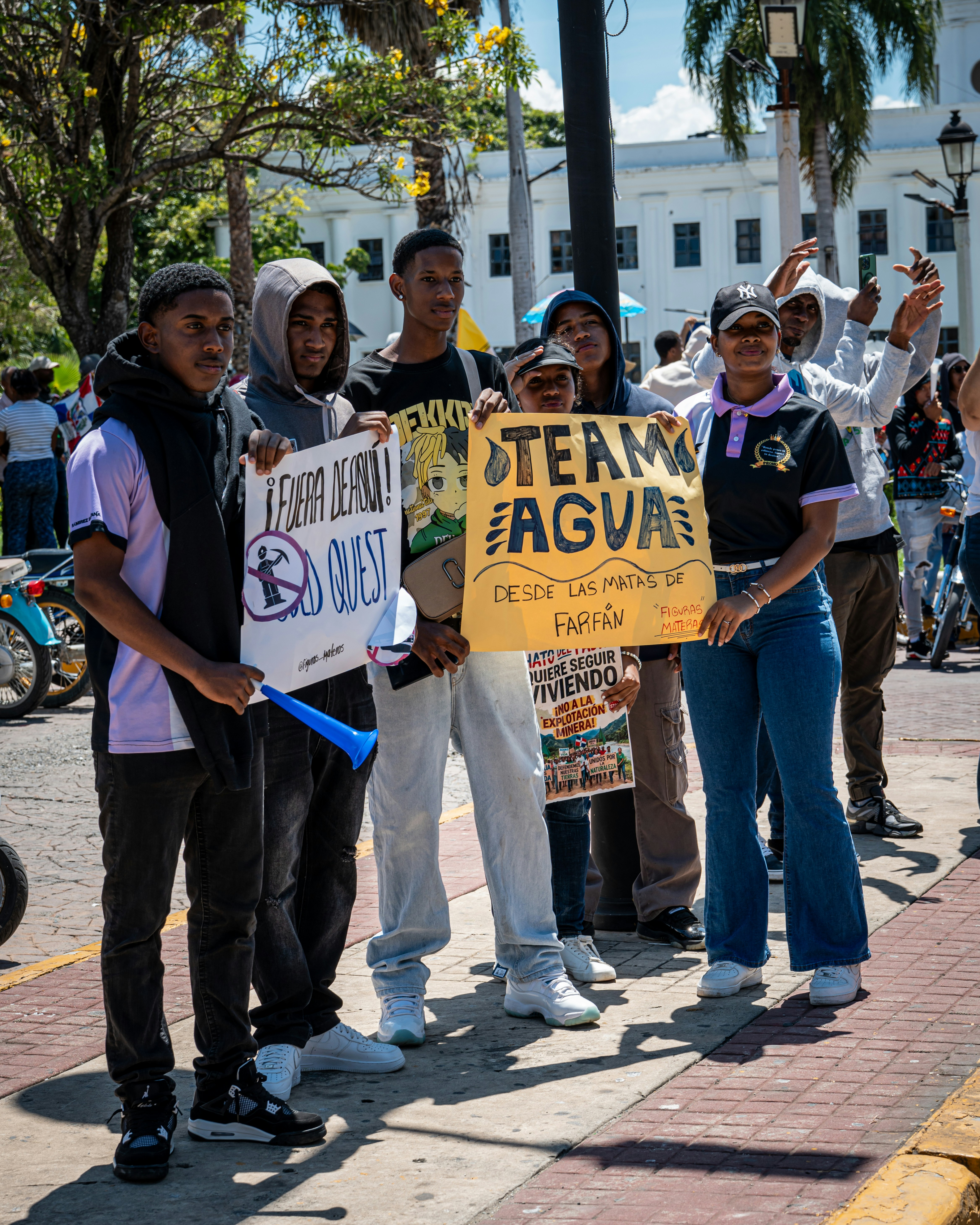 African youth activists speaking passionately about climate change at a public rally