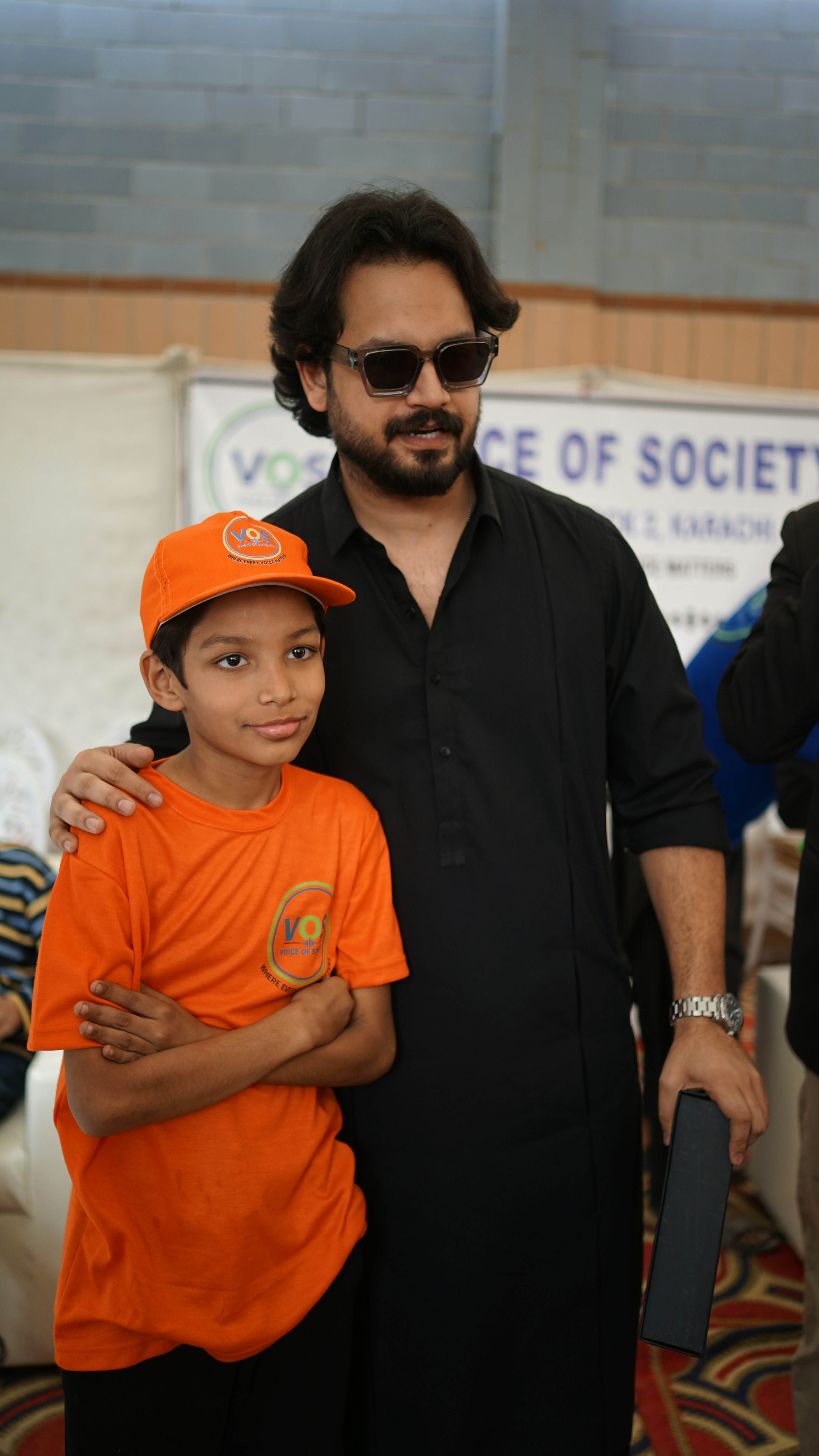 volunteers helping children