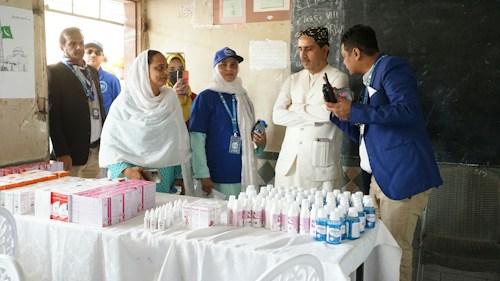 Health workers managing pharmaceutical supplies