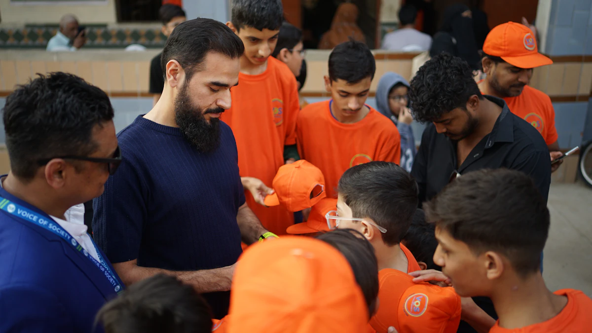 A volunteer handing out support to someone in the community