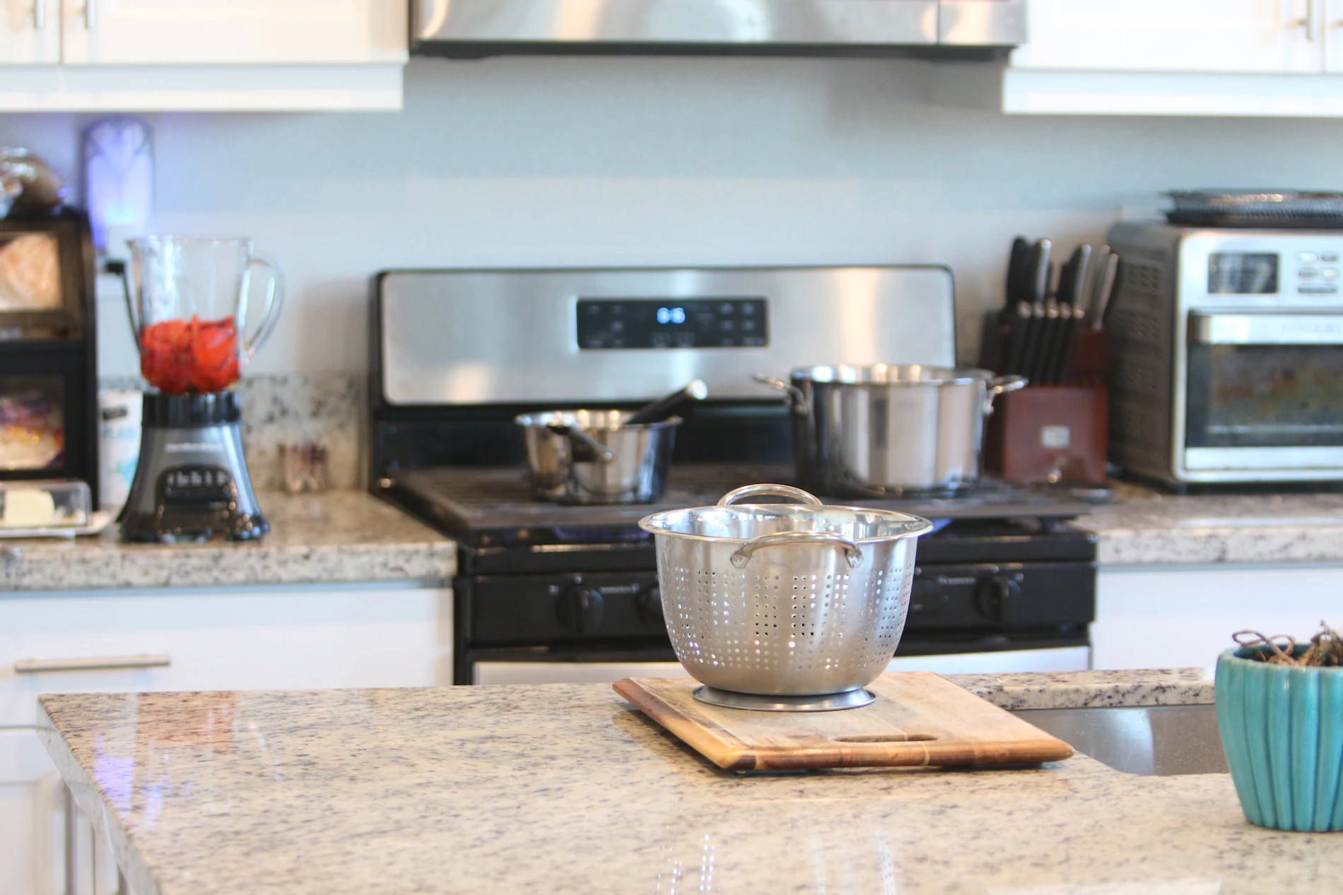 Modern home kitchen with oven blender and food preparation area