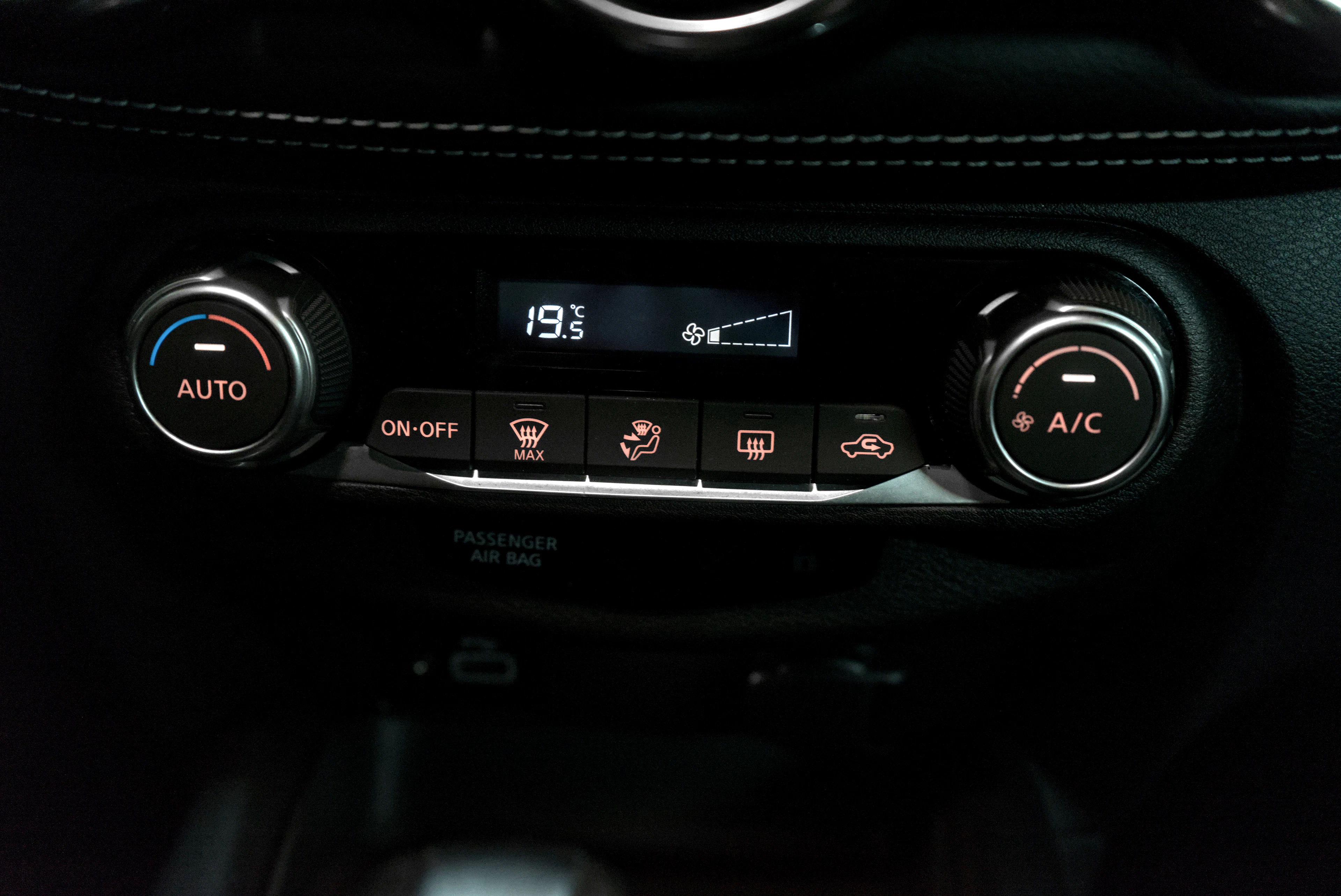 Climate control panel with the A/C button