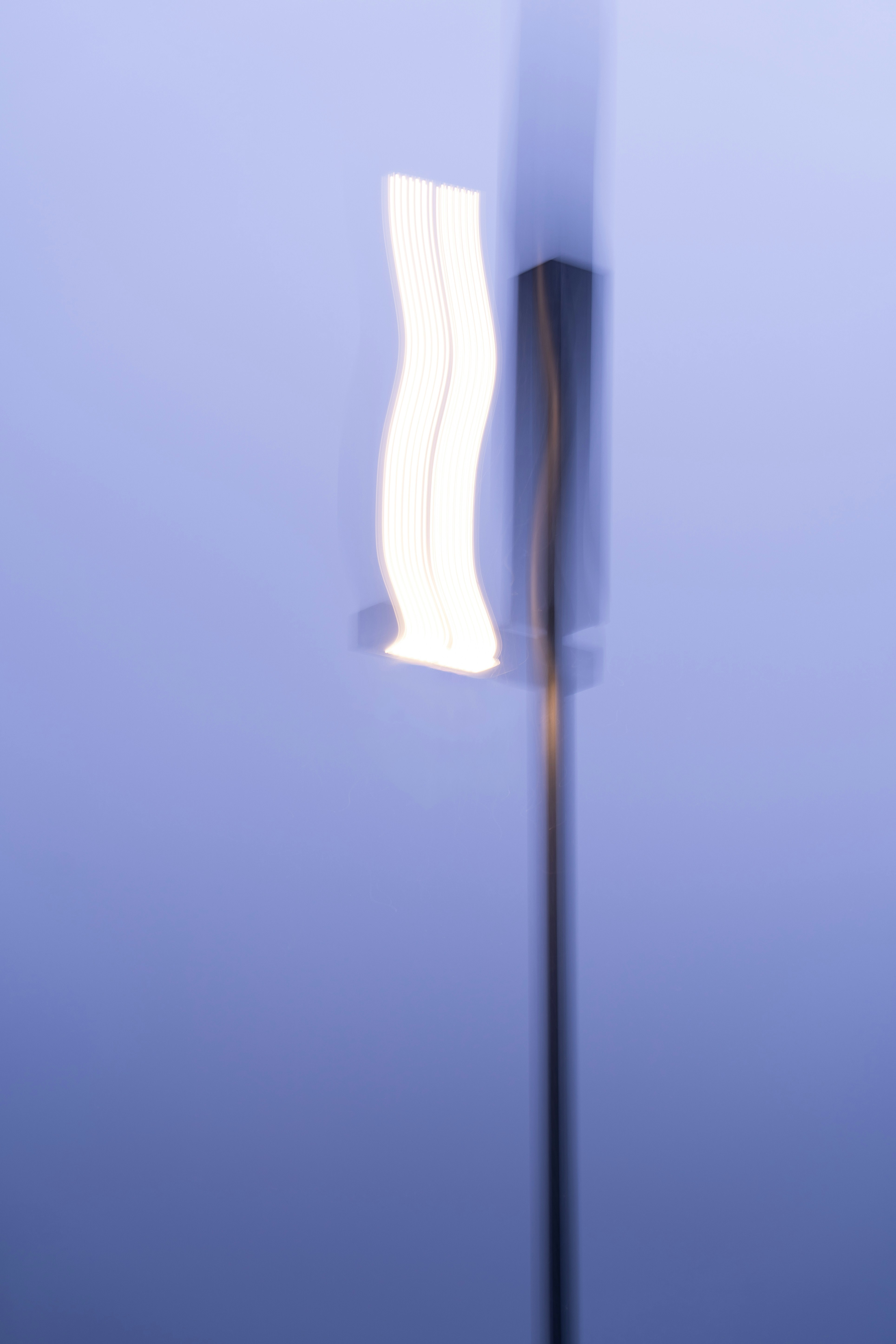 Abstract light streaks on a blue background