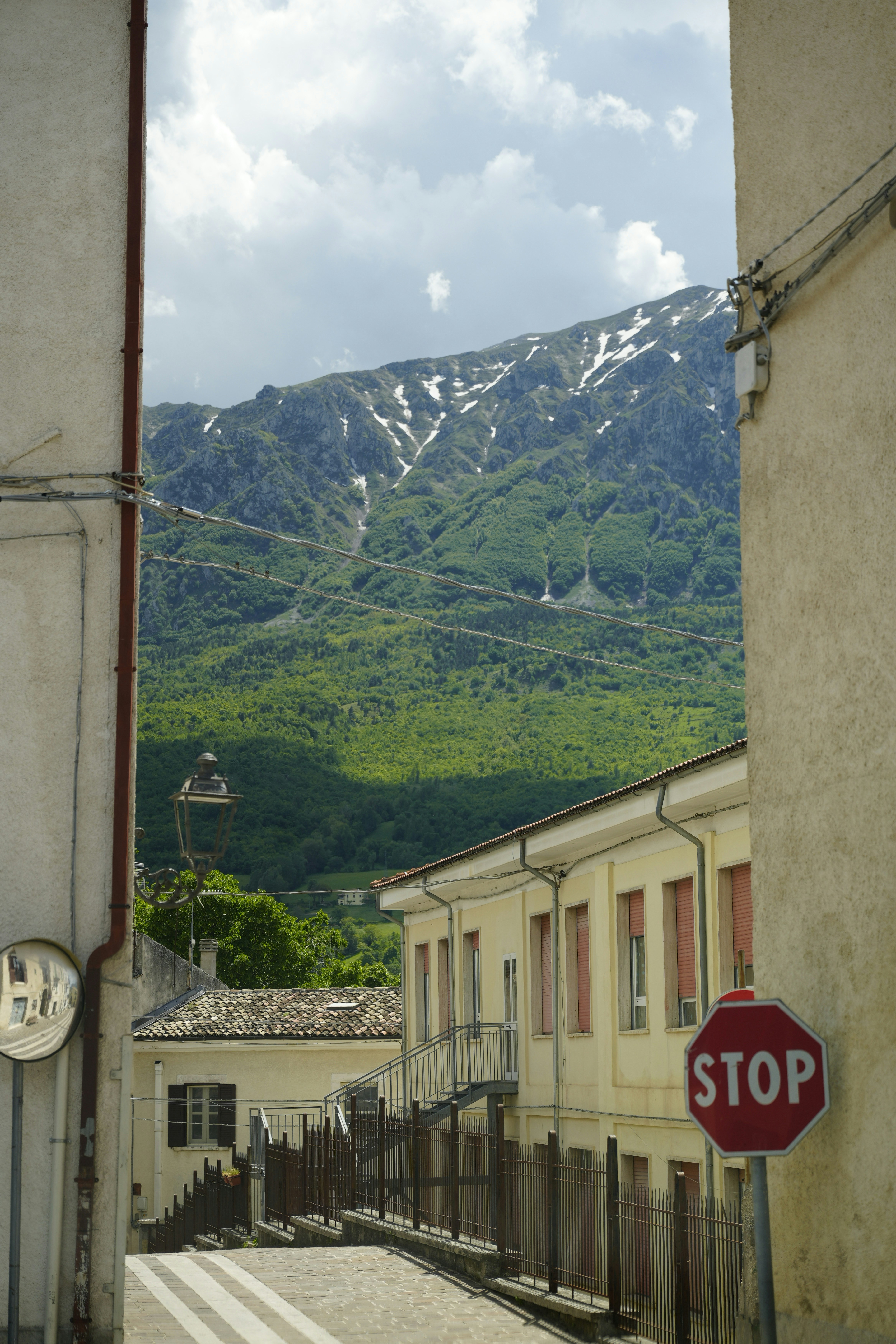 Street view with mountains and buildings