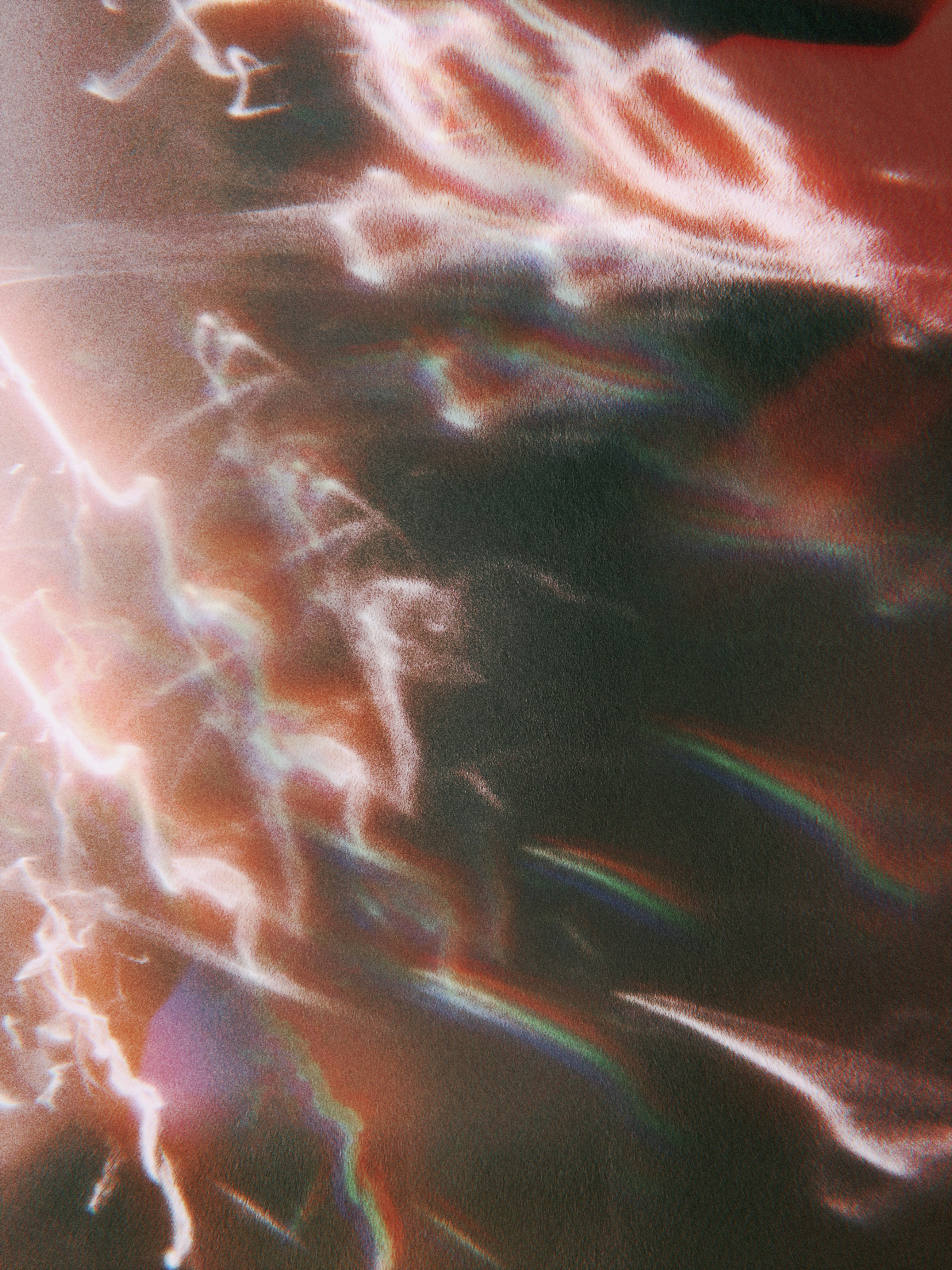 Riscos abstratos de luz com efeitos prismáticos