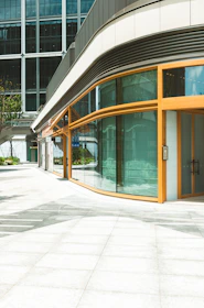 Modern building with glass facade and wooden accents