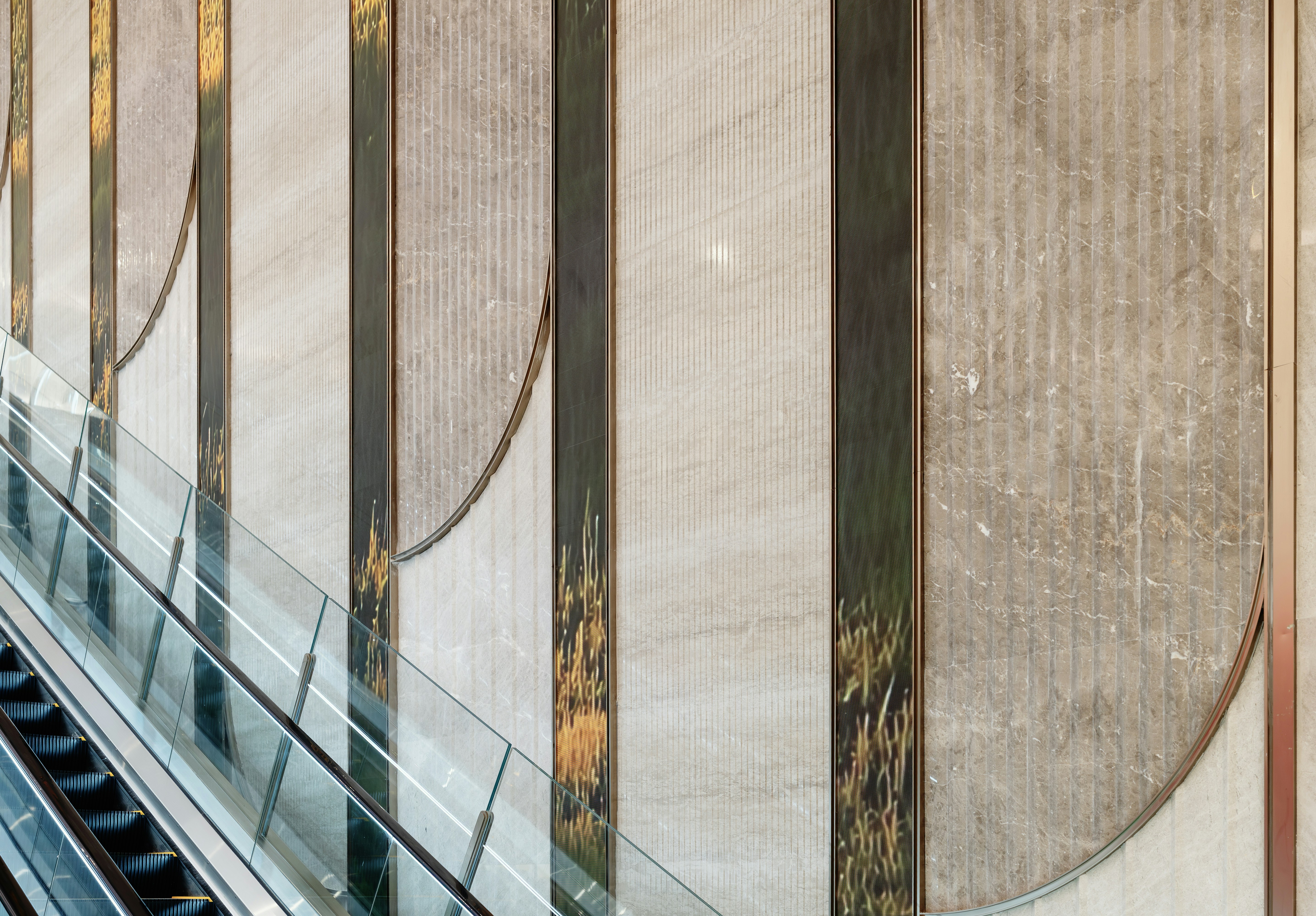 Modern escalator and decorative wall panels
