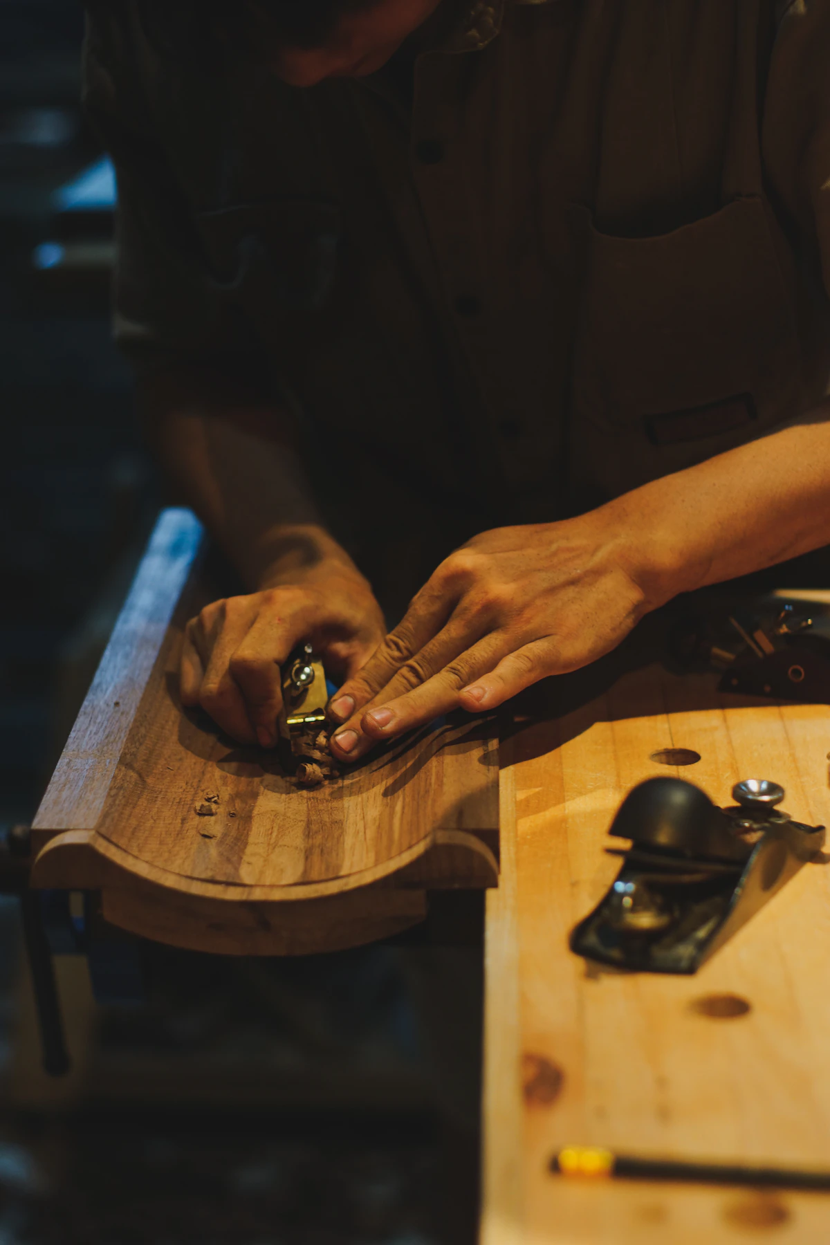 Hand-planing a face frame — the last thousandth still comes off with a plane