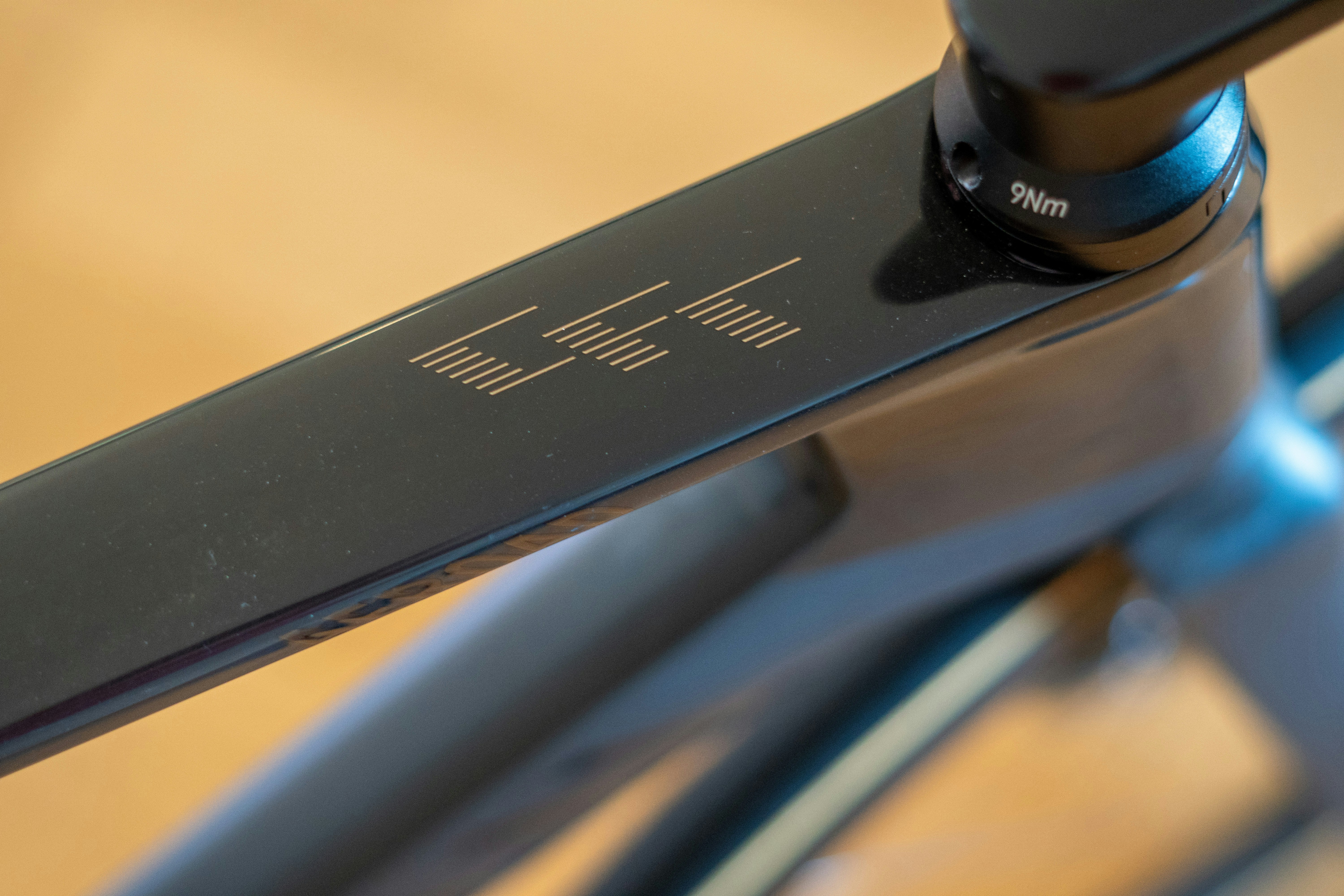 Dark bicycle frame with "cft" logo.