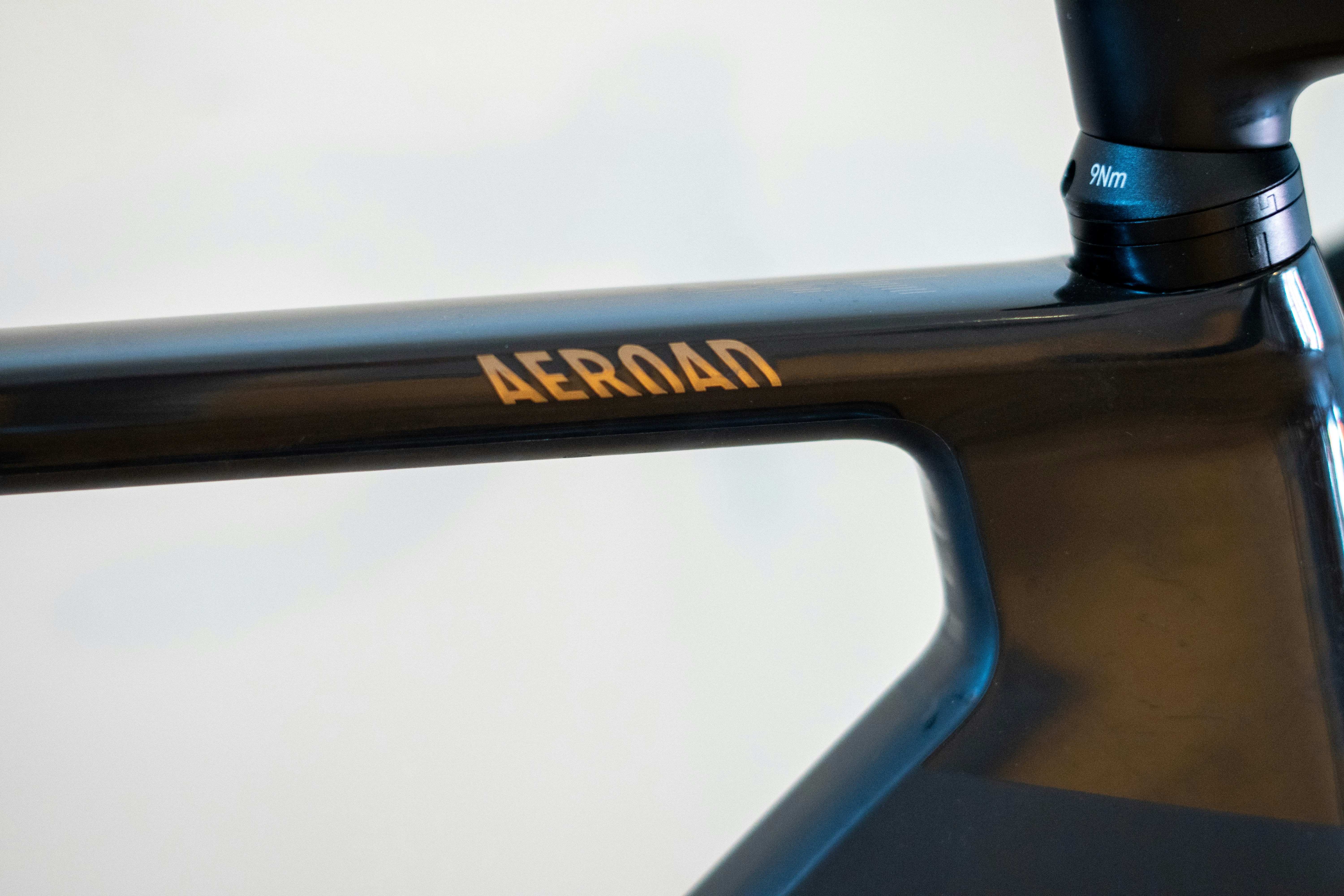 Close-up of the word "aeroad" on a bicycle frame