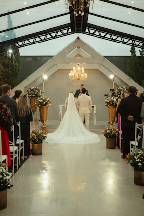 Bride and groom standing at the altar during their wedding.