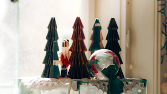 Christmas decorations including nutcracker and trees
