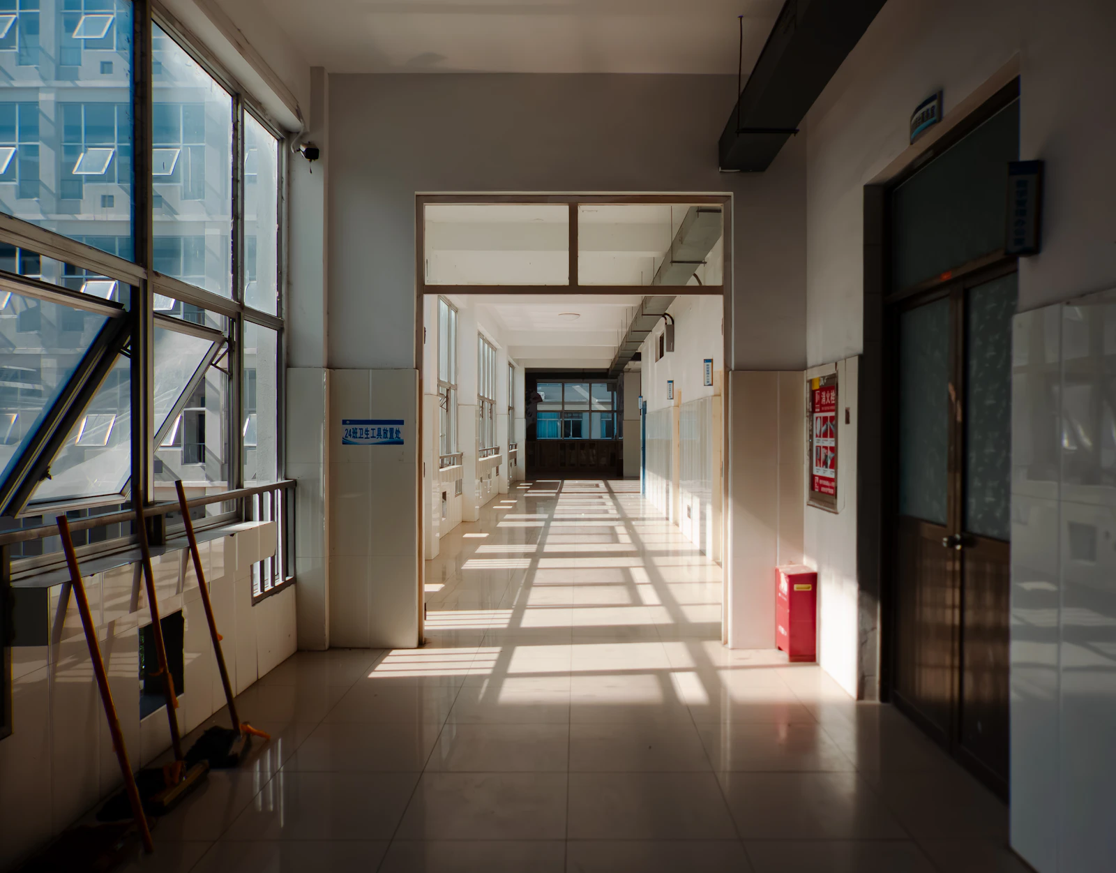 Long bright hospital hallway with natural light