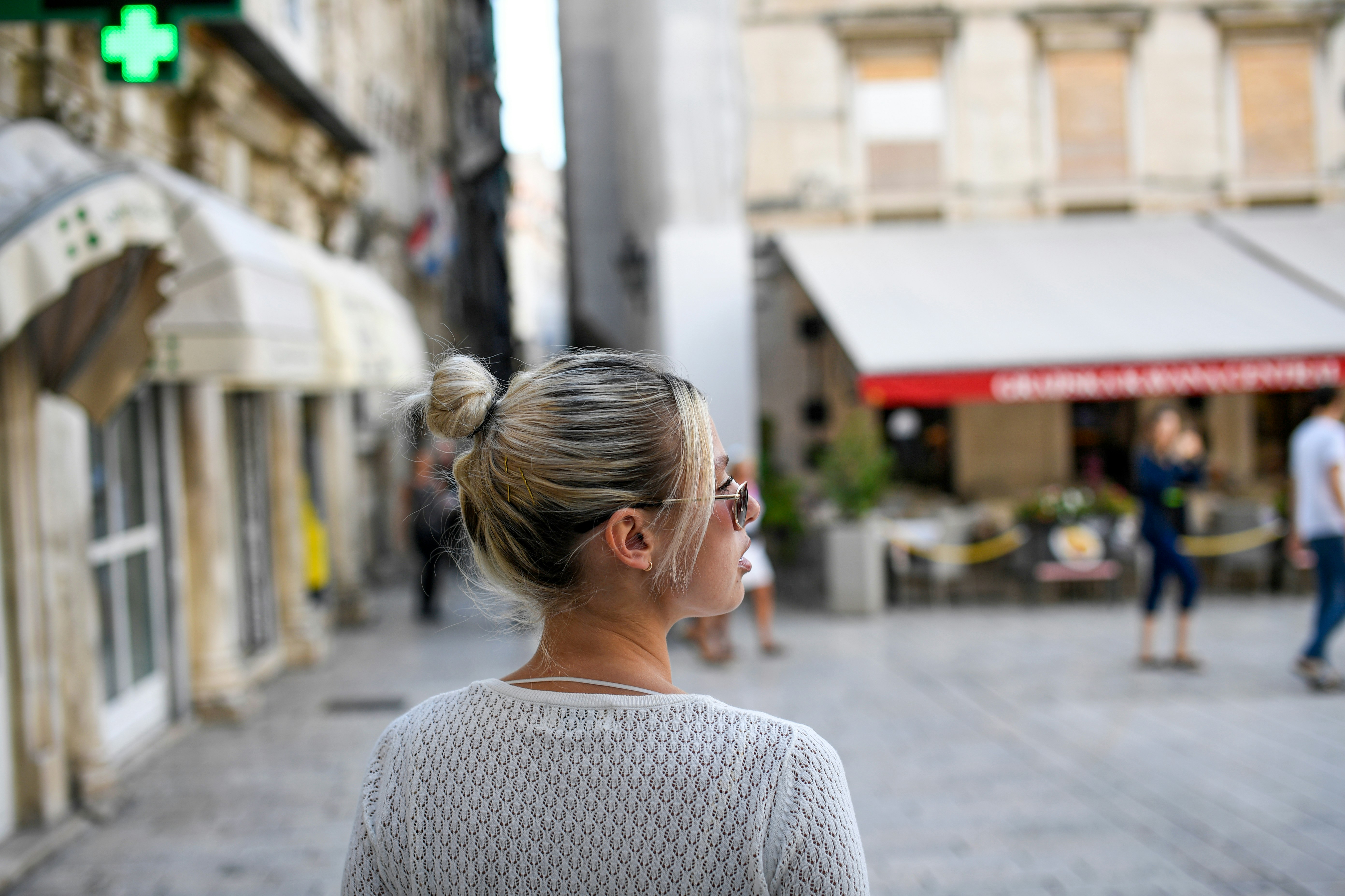 person feeling isolated in a European city
