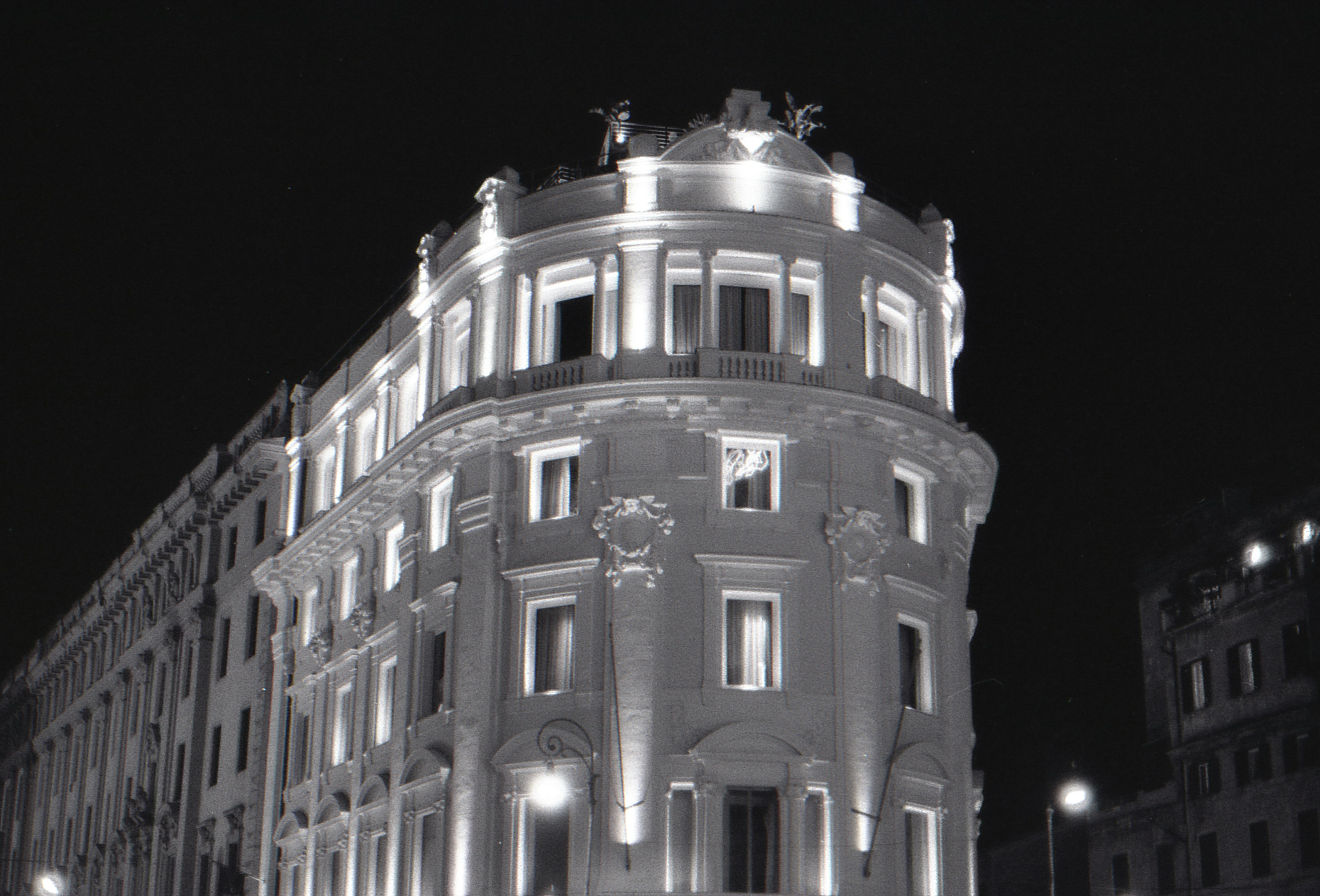 Ornate building facade lit up at night