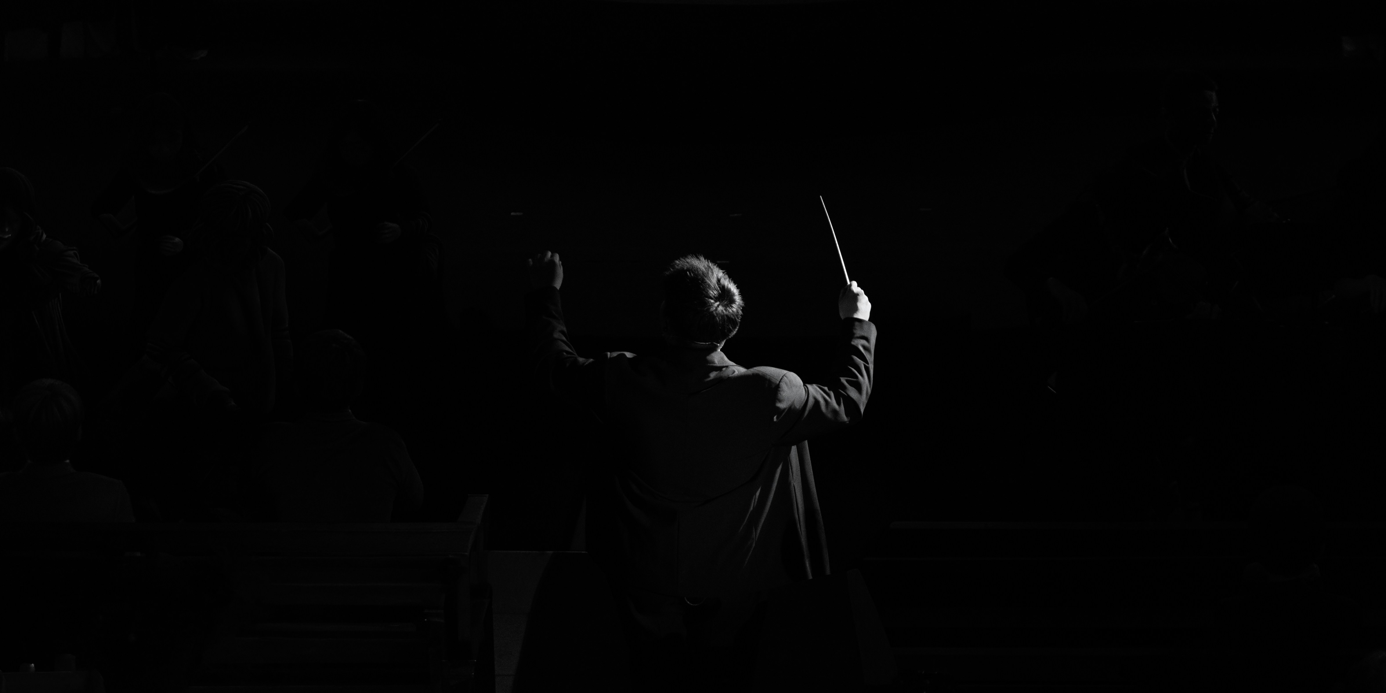 From Podium to Picture: How the Conductor's Instinct Rewires the Filmmaker's Eye
