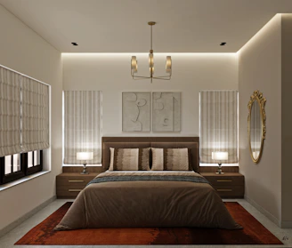 Modern bedroom with elegant bed, lighting, and decorative mirror.