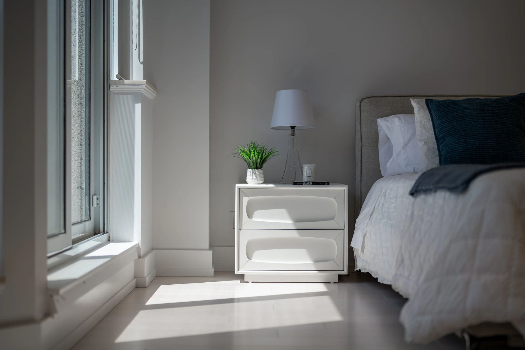 Cozy bedroom interior with soft morning light