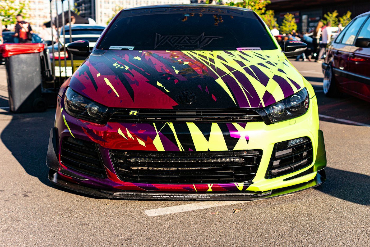 Custom split-colour vehicle wrap in red and purple