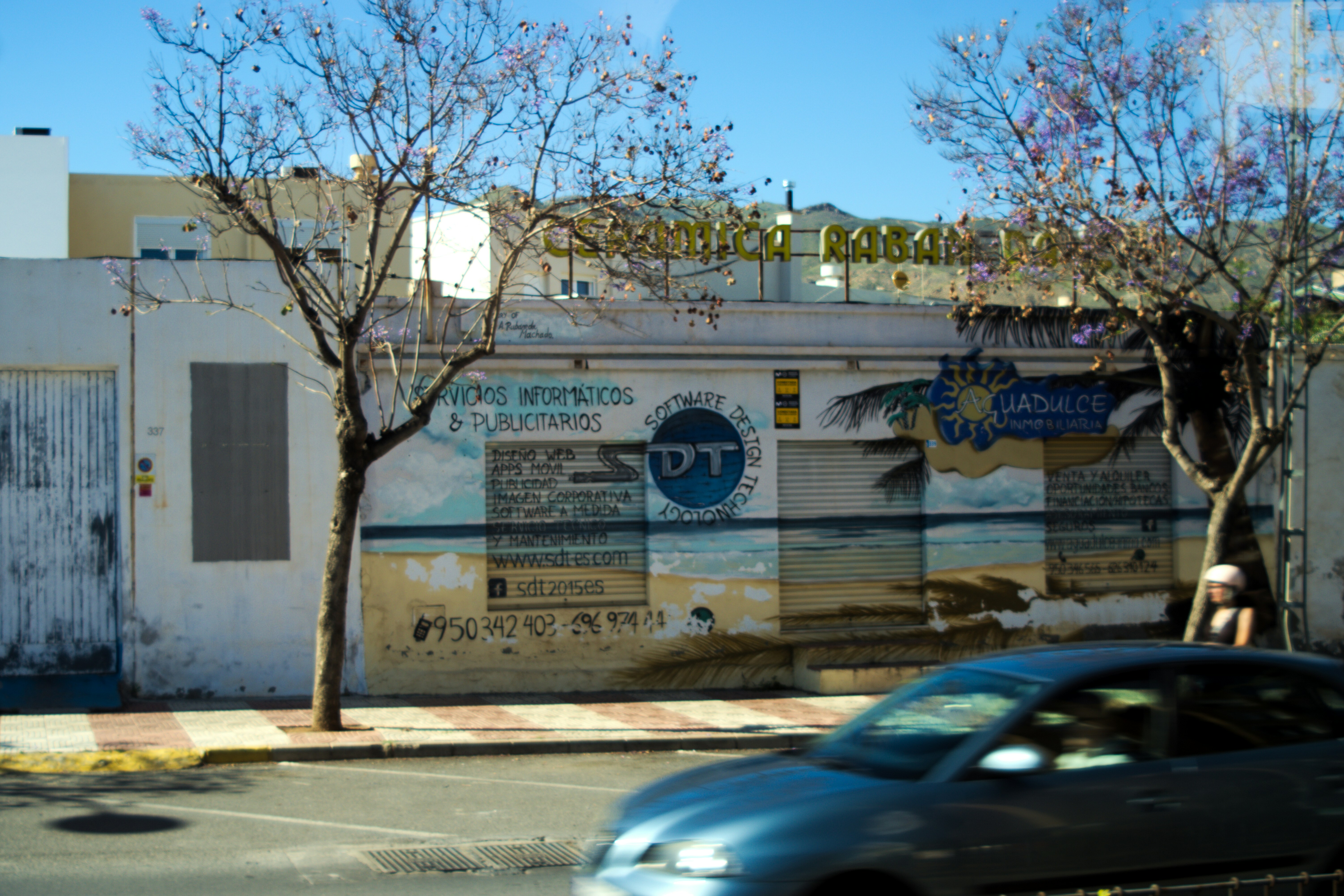 This an urban scene. The main focus is on rather unpleasant buildings in the outskits of Almeria