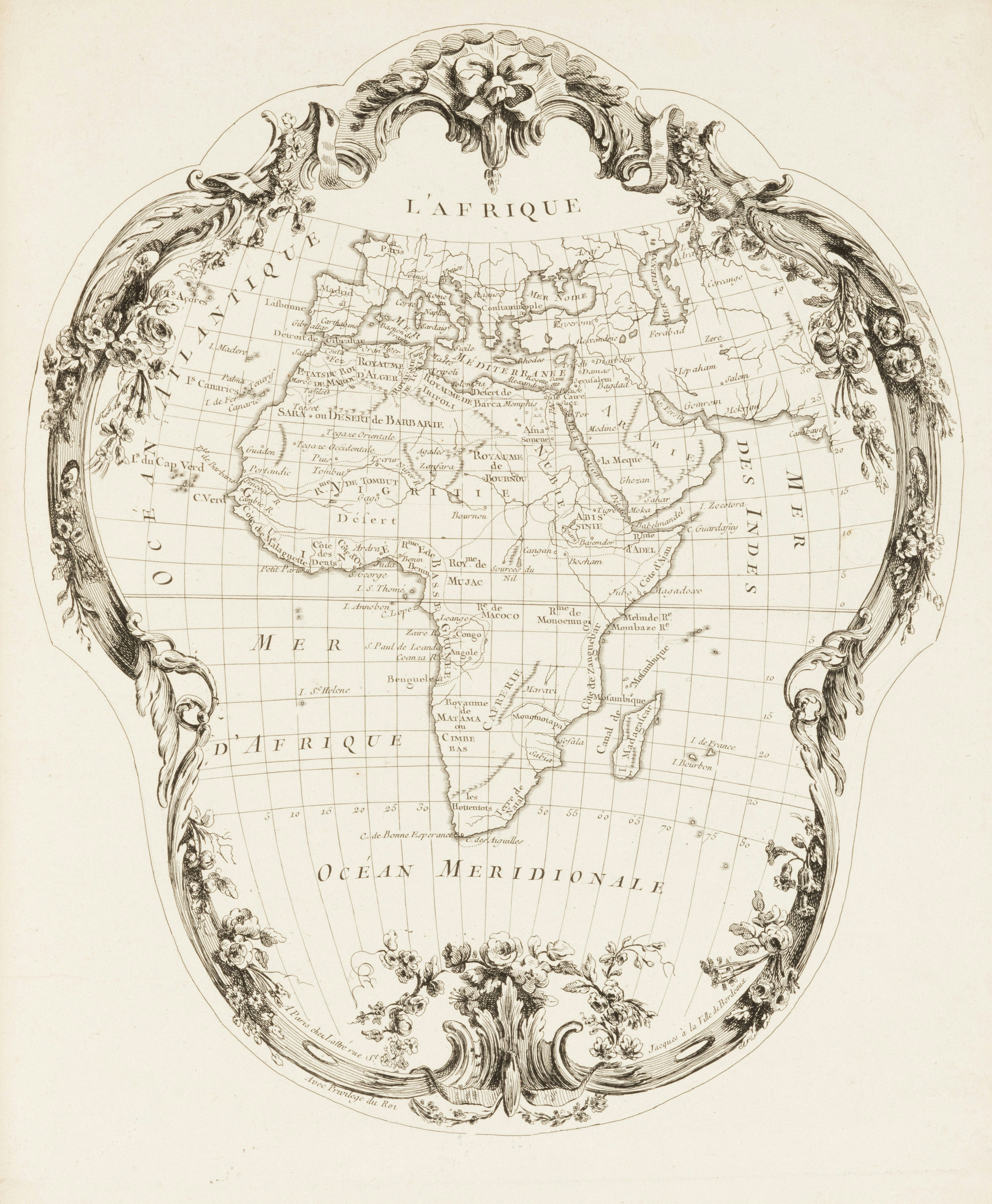 Um mapa antigo da África com bordas rococó ornamentadas.
