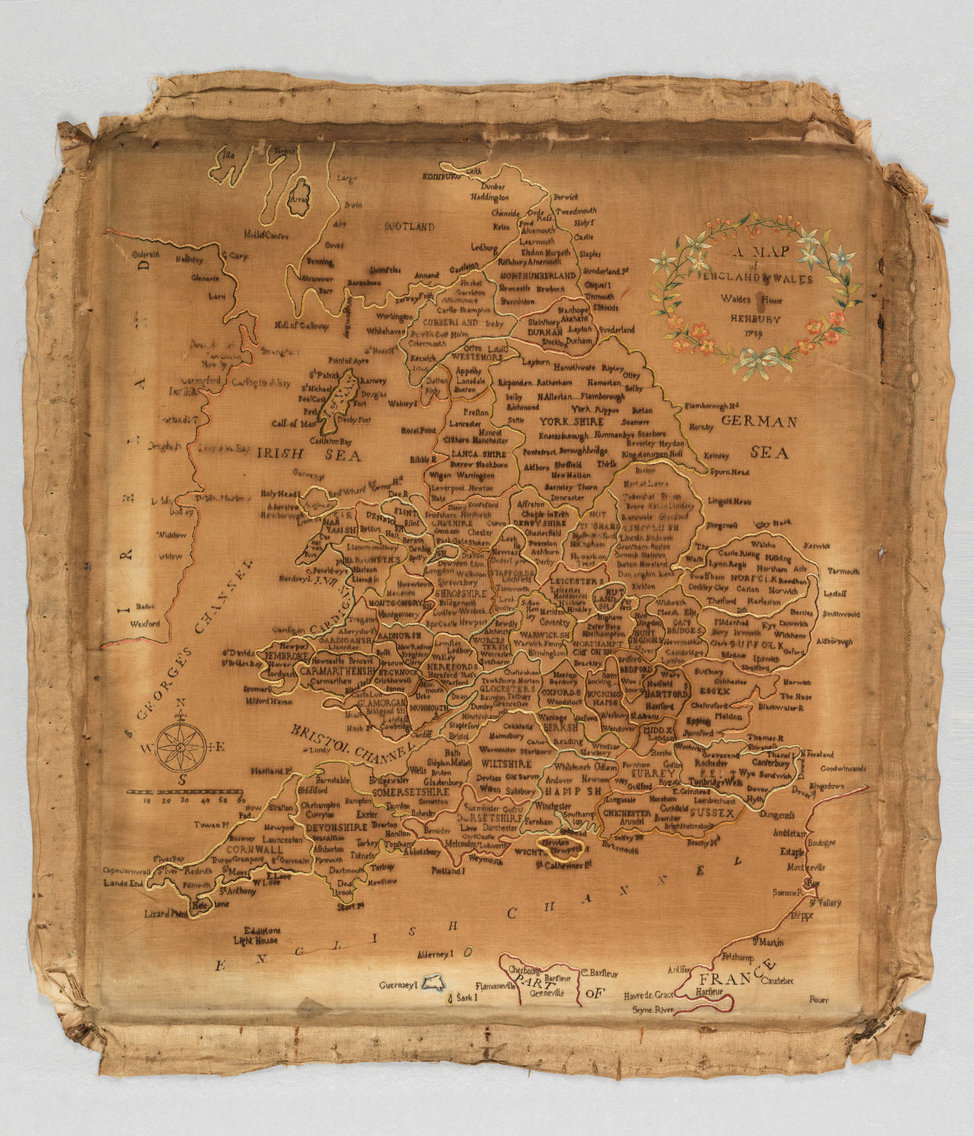 Ancient, tattered map of europe with detailed place names.