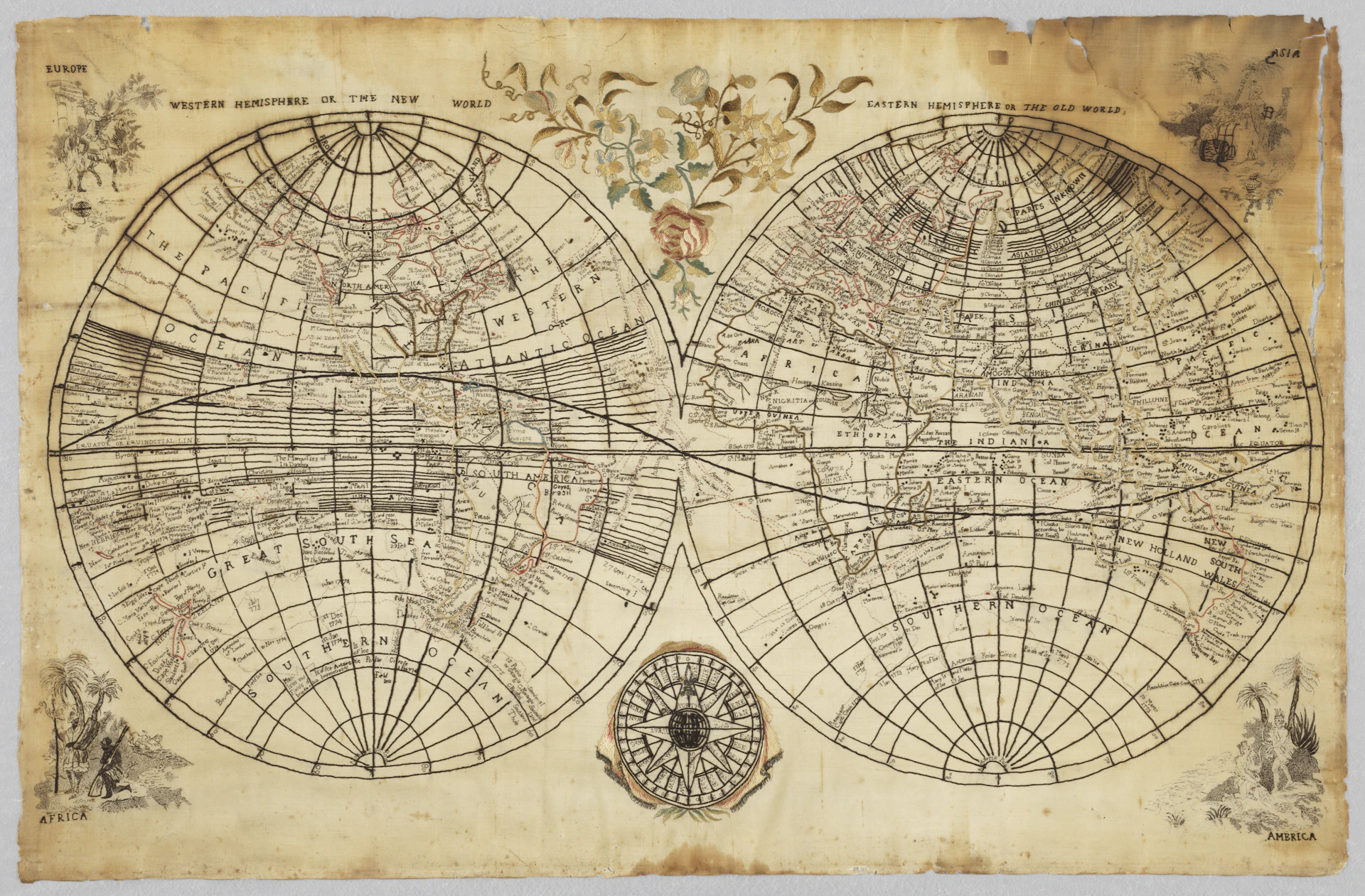 Antique world map with two hemispheres and decorative elements.