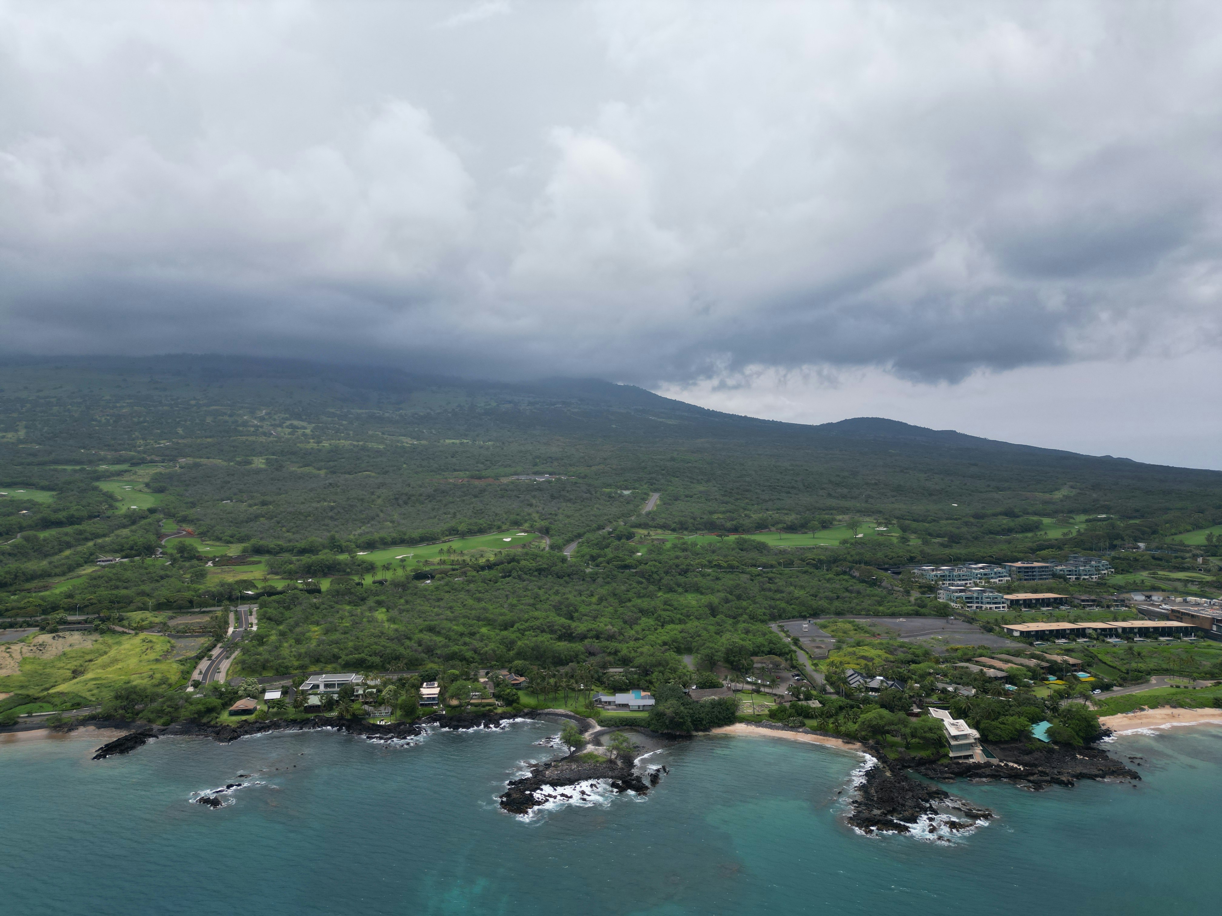Aerial map-like view of the Wailea-Makena coastline and bright blue water on Maui