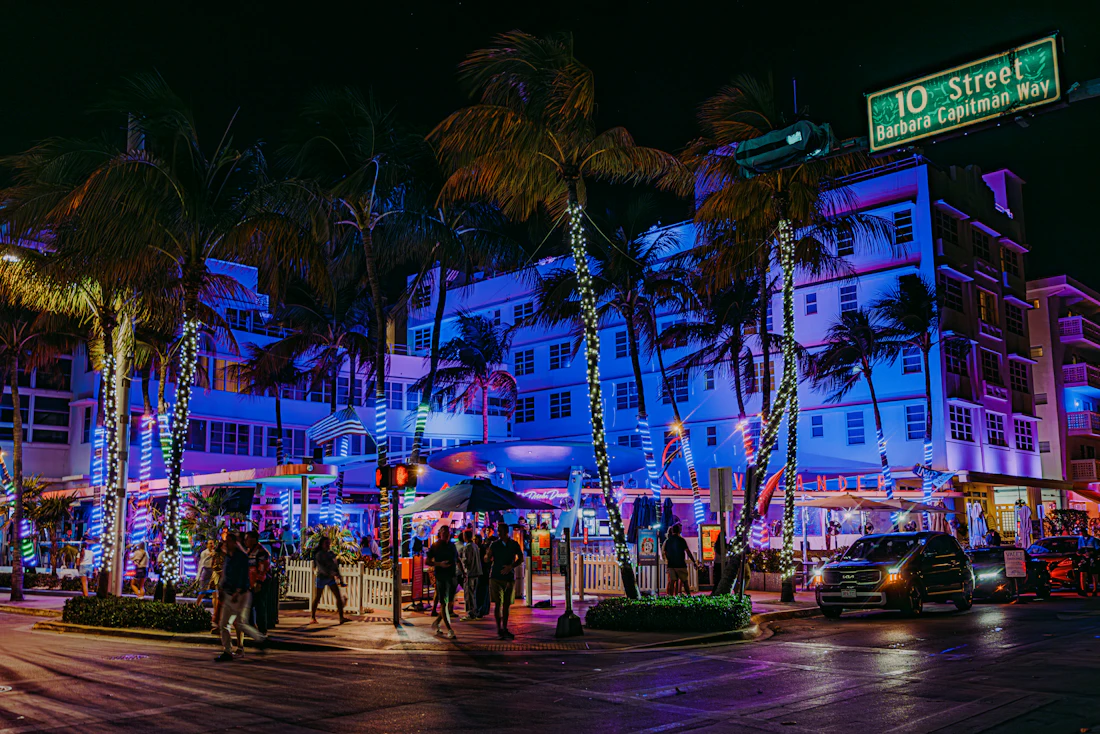 Neon-lit Miami nightlife with palm trees