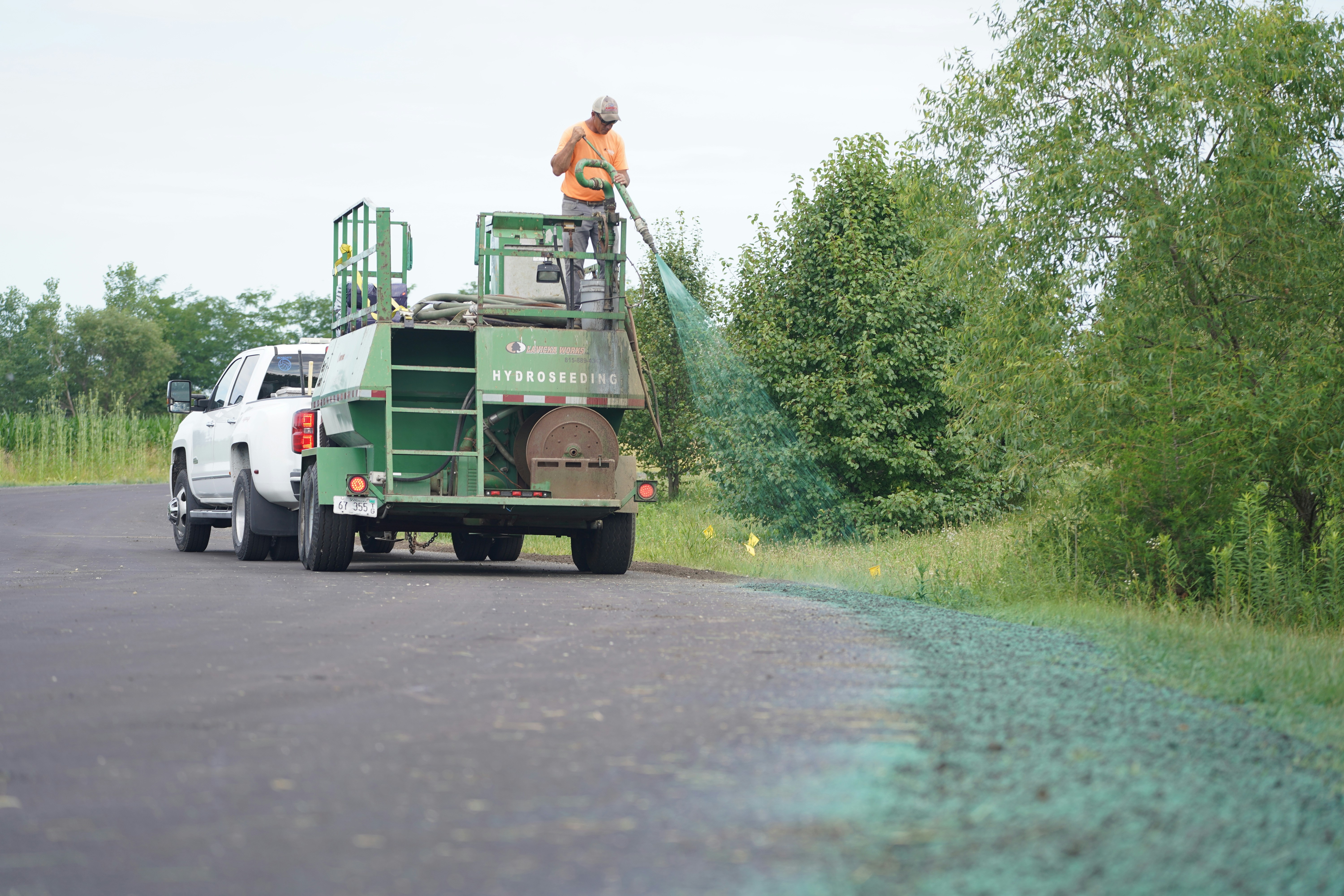 Applying paver sand sealer using a low-pressure pump sprayer