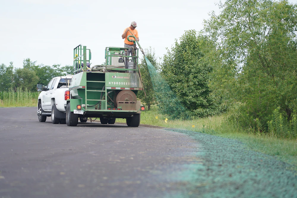 Hydroseed being sprayed on a new-estate lot
