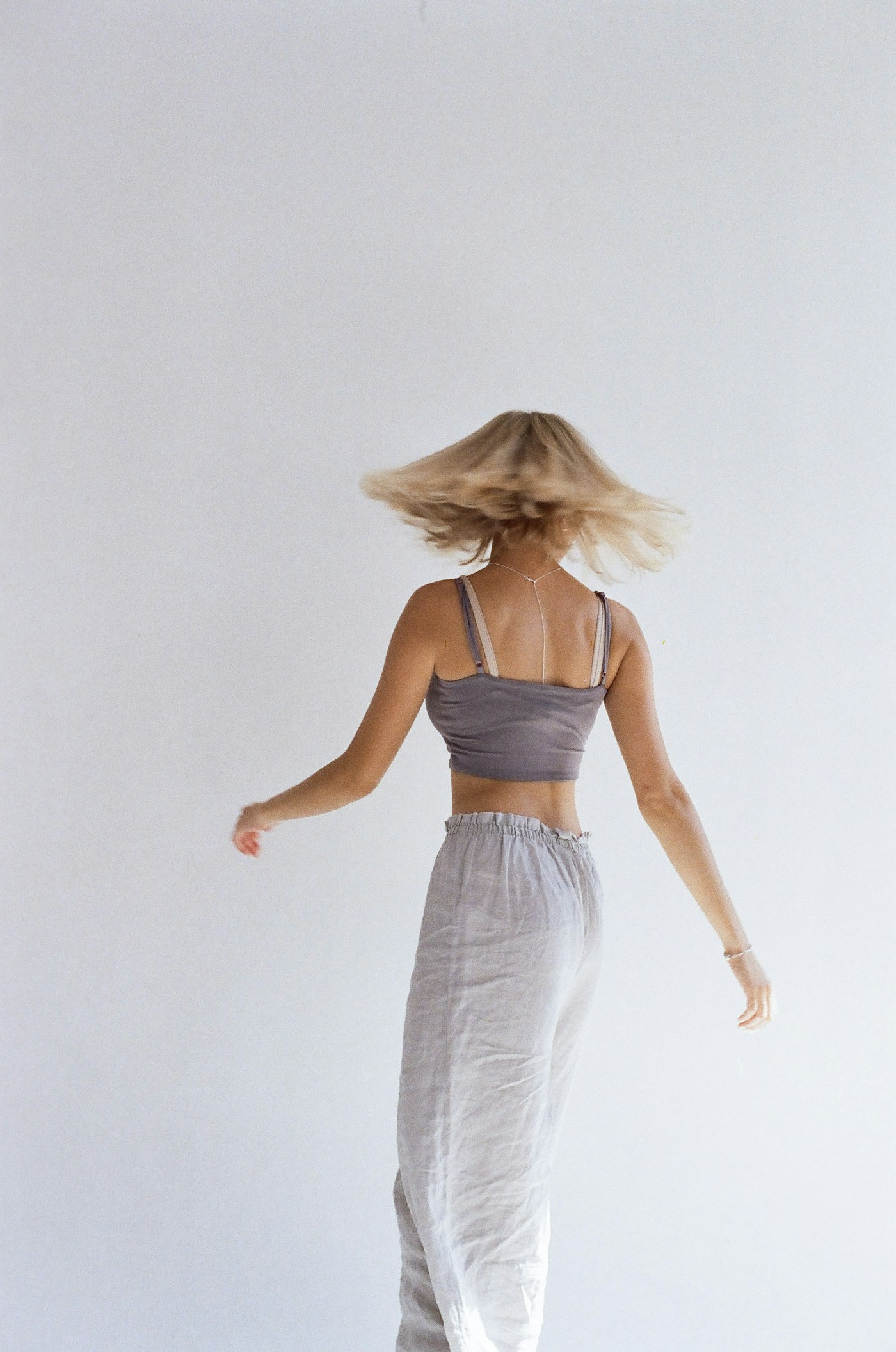 Atelier Linen Trousers — wide-leg back view